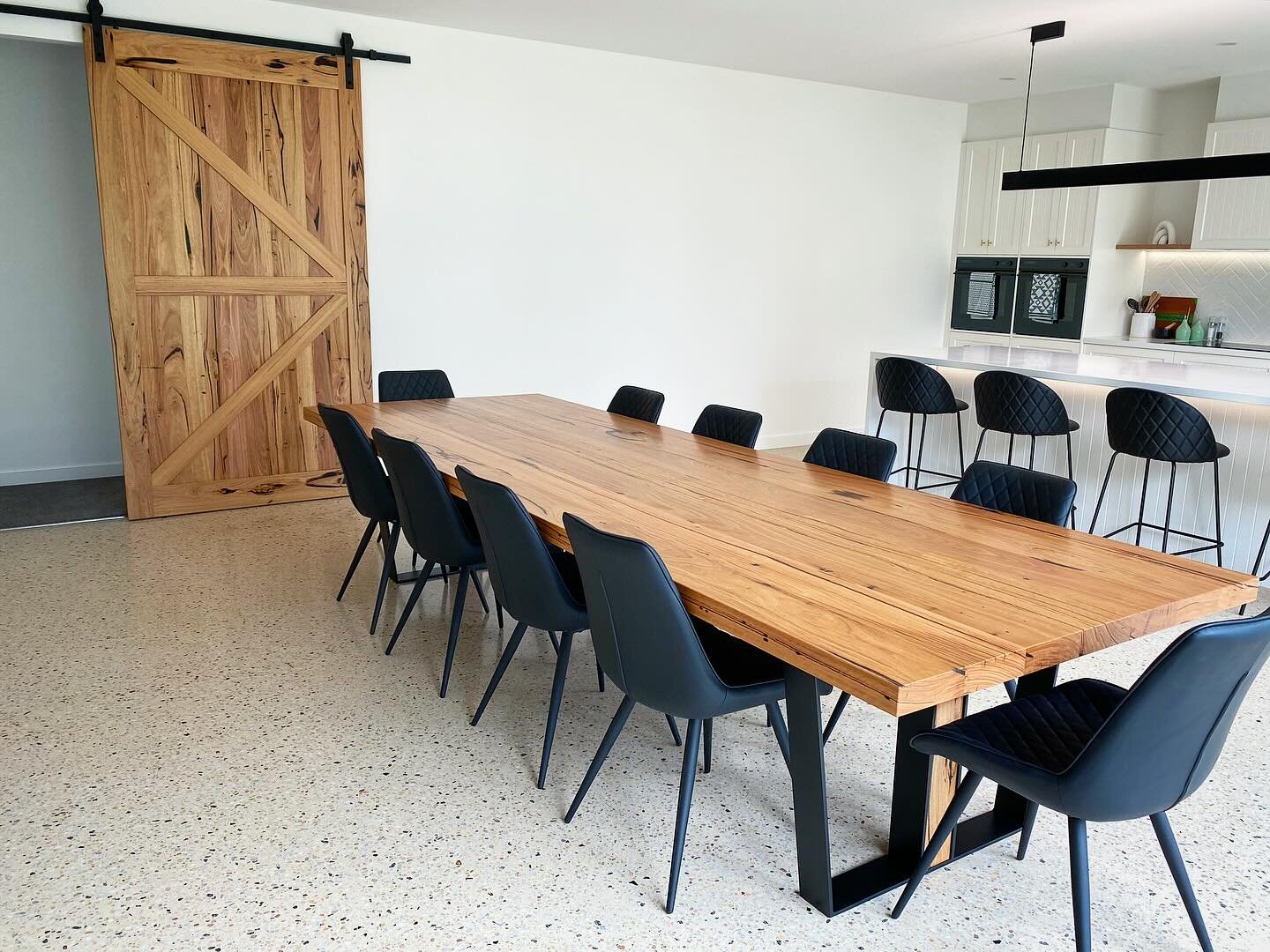 Big space needs a big barn door and an even bigger dining table! Beautiful splash of colour in Mitch and Rach&rsquo;s brand new build. Recycled Messmate Barn Door and Dining Table sits in this space perfectly 👌🏻
.
.
.
#recycled #messmate #diningtab