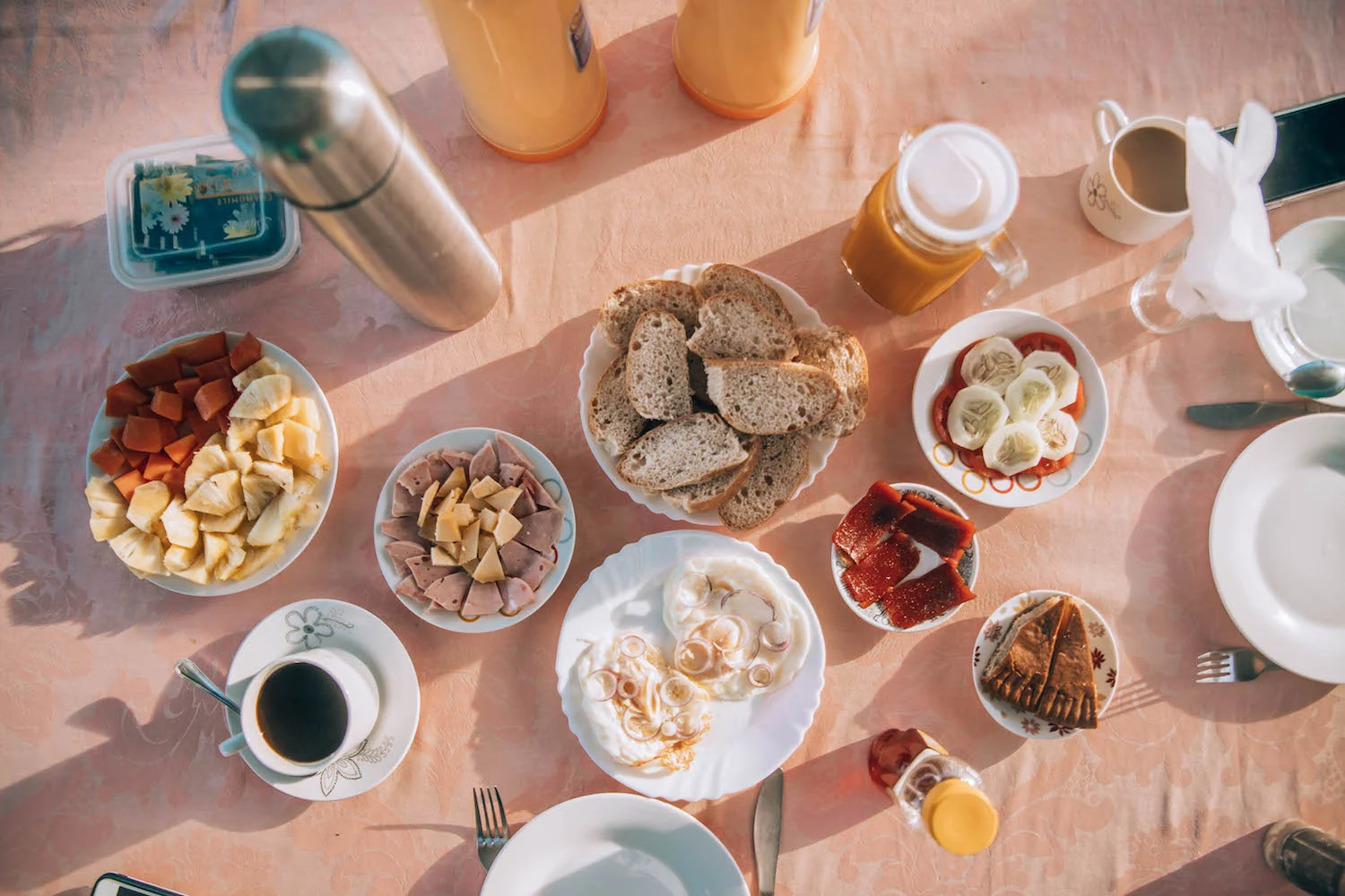 The amazing home-cooked breakfast we were served each morning at our farm homestay. Fresh eggs, coconut-pineapple custard pie, preserves, bread, tropical fruits, papaya juice, cheese, and more!