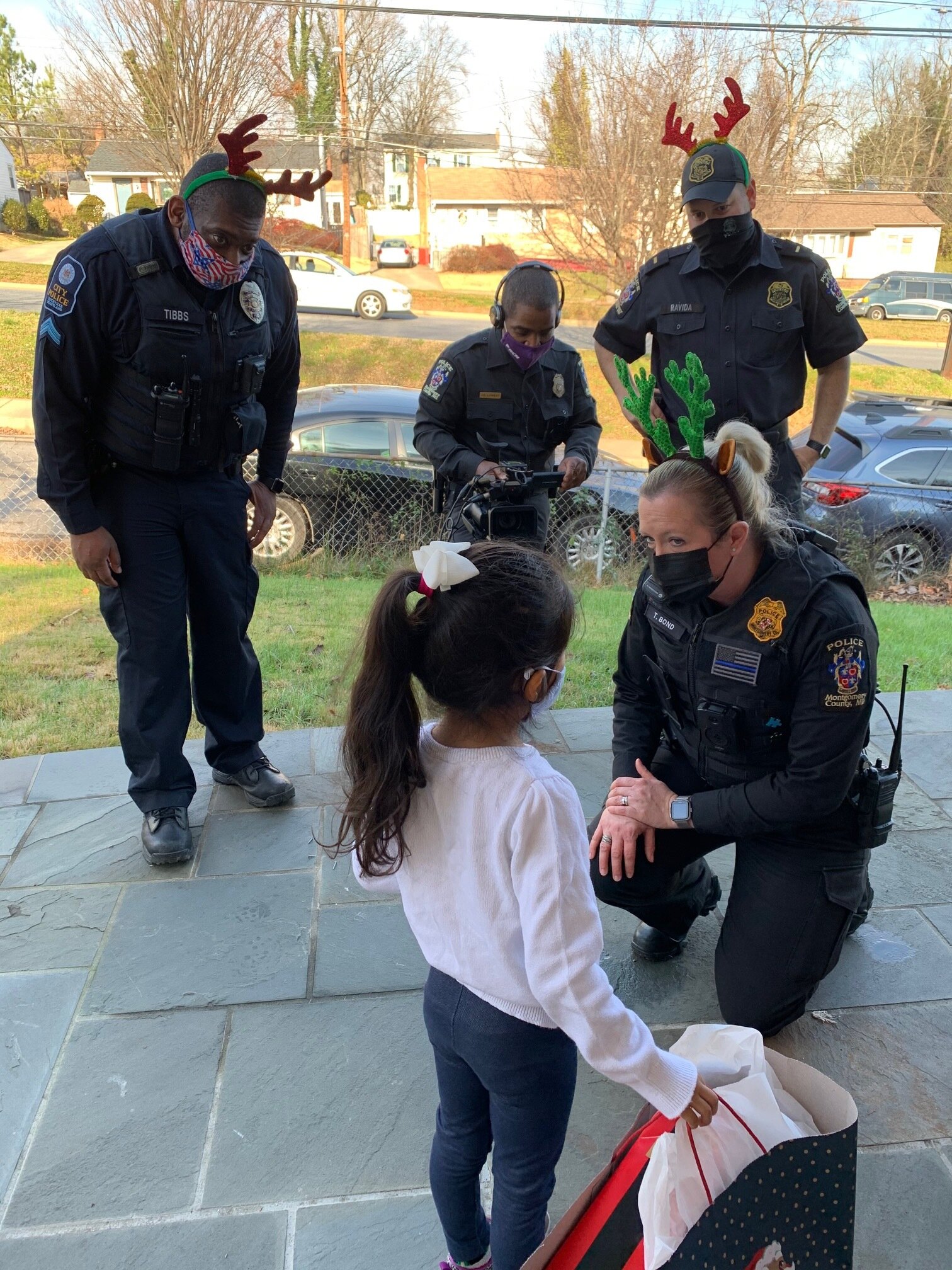 Officer Bond making the Holiday Gift Giving Special.jpeg