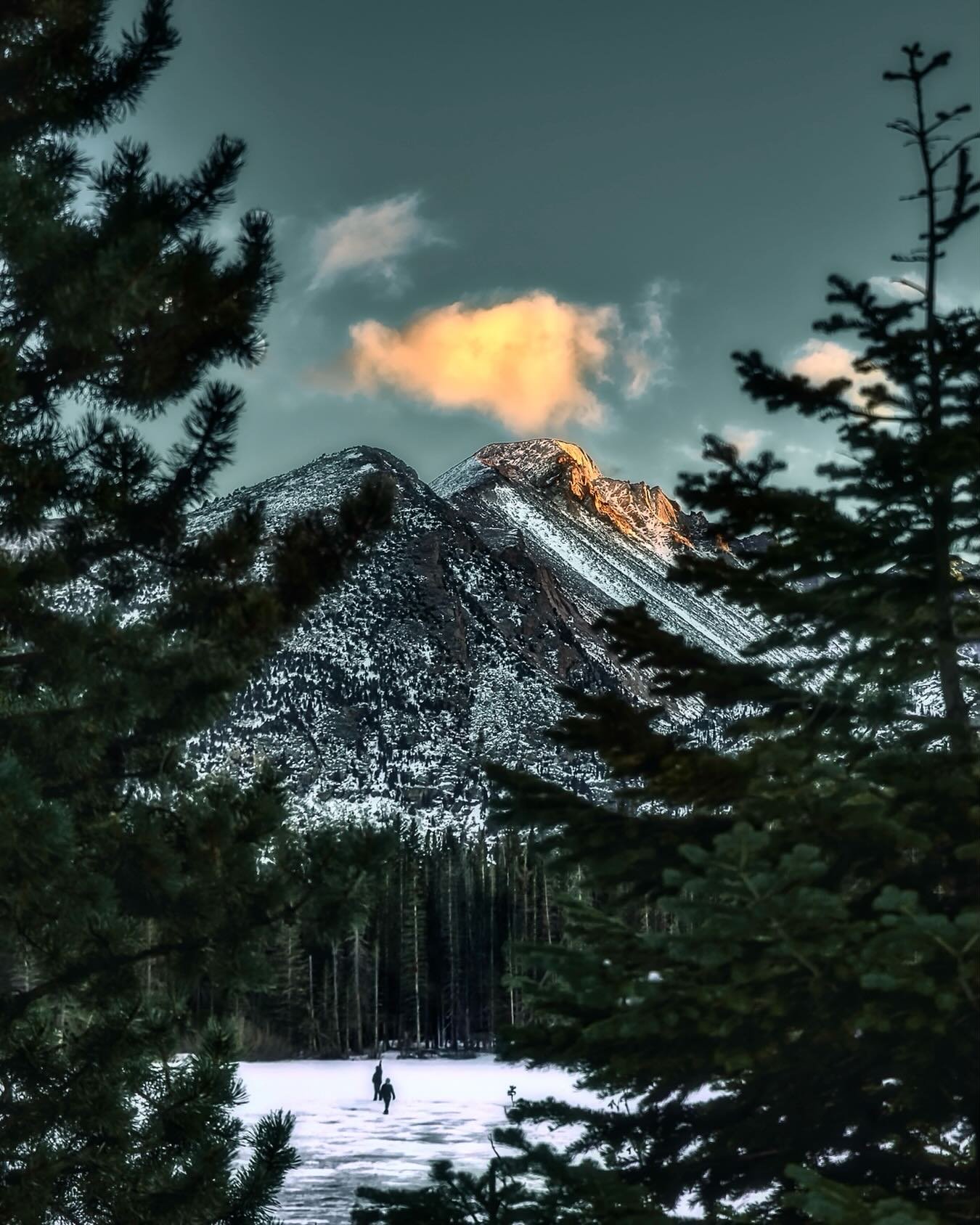 ~ F R A C T U R E ~
.
Cracked ice. A single cloud burns. 🔥
.
Two people, miles of silence. 🤫
.
Sometimes the distance says more than the view. 🚶🏻&zwj;♂️
.
#tbt 
.
📍Rocky Mountain National Park
🖼️ Prints available at neos-photography.com
🎯 Phot
