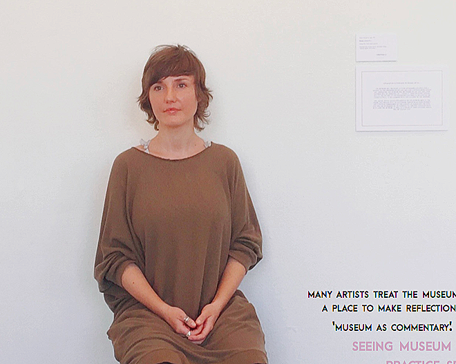 Contemporary performance artwork by Micah Kessel, featuring a seated human artwork in a gallery setting for Human Art Exhibition No. 1, exploring presence, conversation, emotional authenticity, and the boundary between person and artwork.