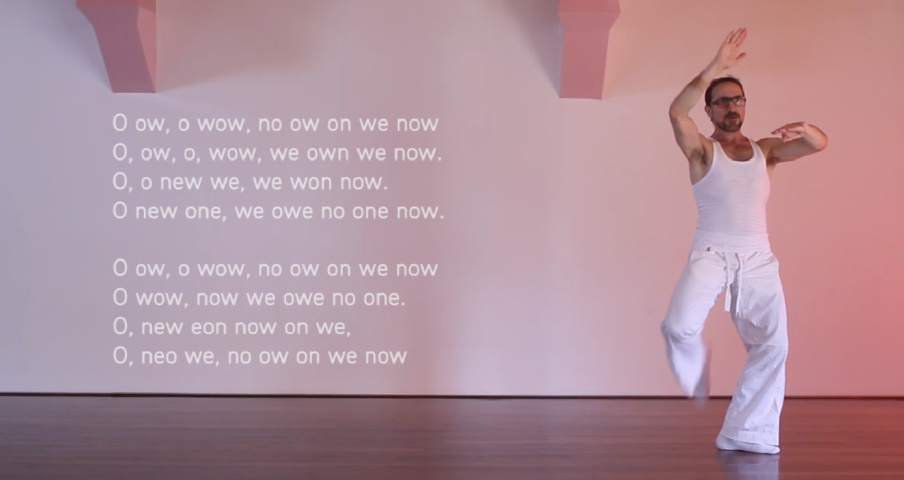 Interactive dance and language installation by Micah Kessel titled Letters in Motion, using movement, projected text, and emotional associations with letters to explore the relationship between body, language, memory, and meaning.