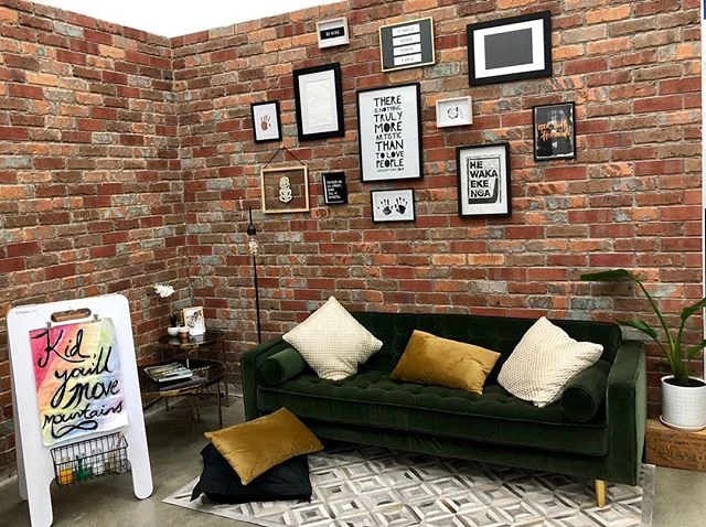 Love this cosy spot for whãnau to relax by our entry and art studio 
#childcaredesign #loft #newyorkloft #velvetcouch #photowall #childcare #reggioinspired