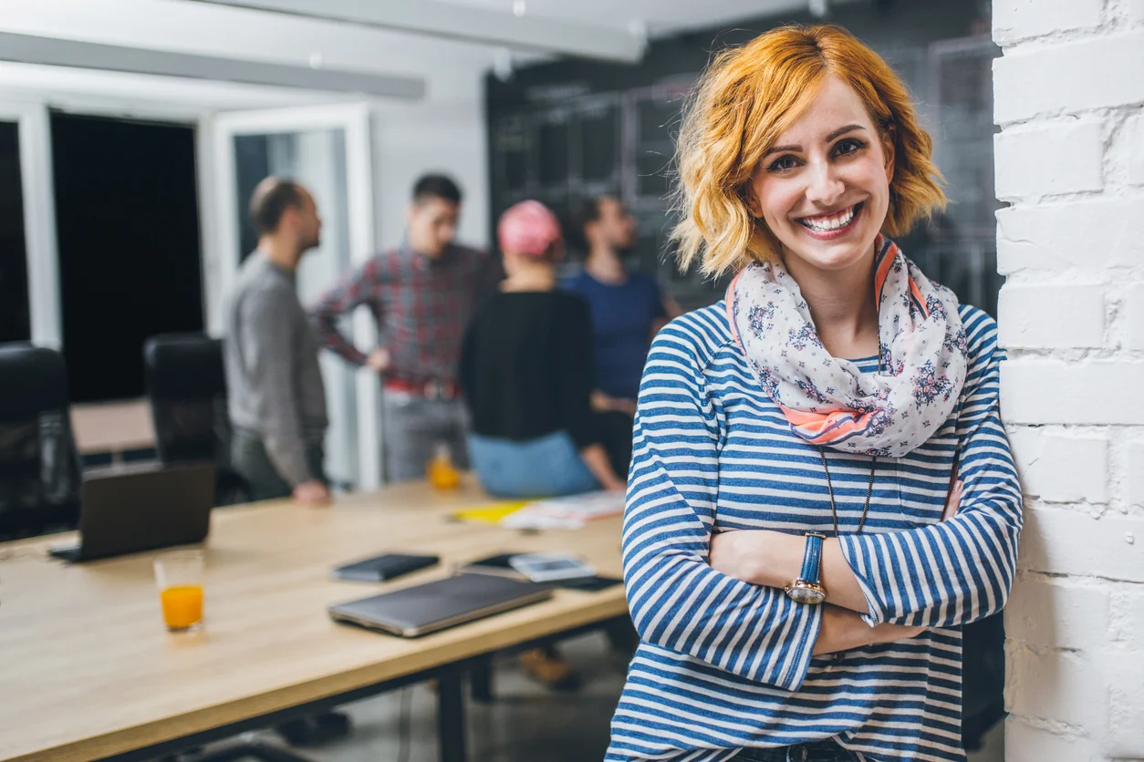 Photo-of-young-business-woman-in-a-conference-room-629805626_1257x838.jpeg