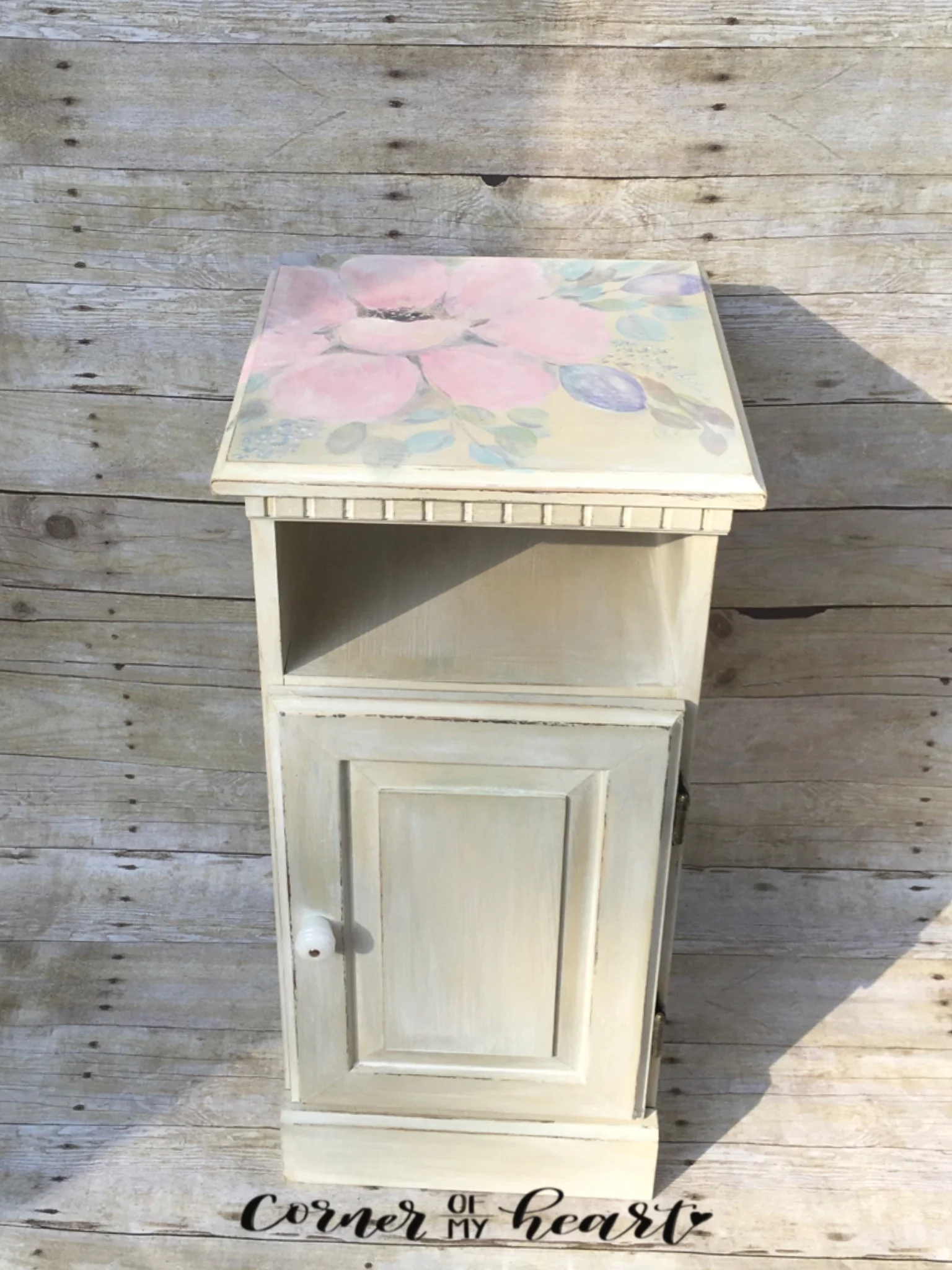 Accent table/cabinet with flower