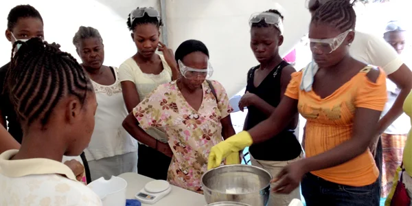 Learning the art of soapmaking. Photo courtesy of Lovinsoapproject.org