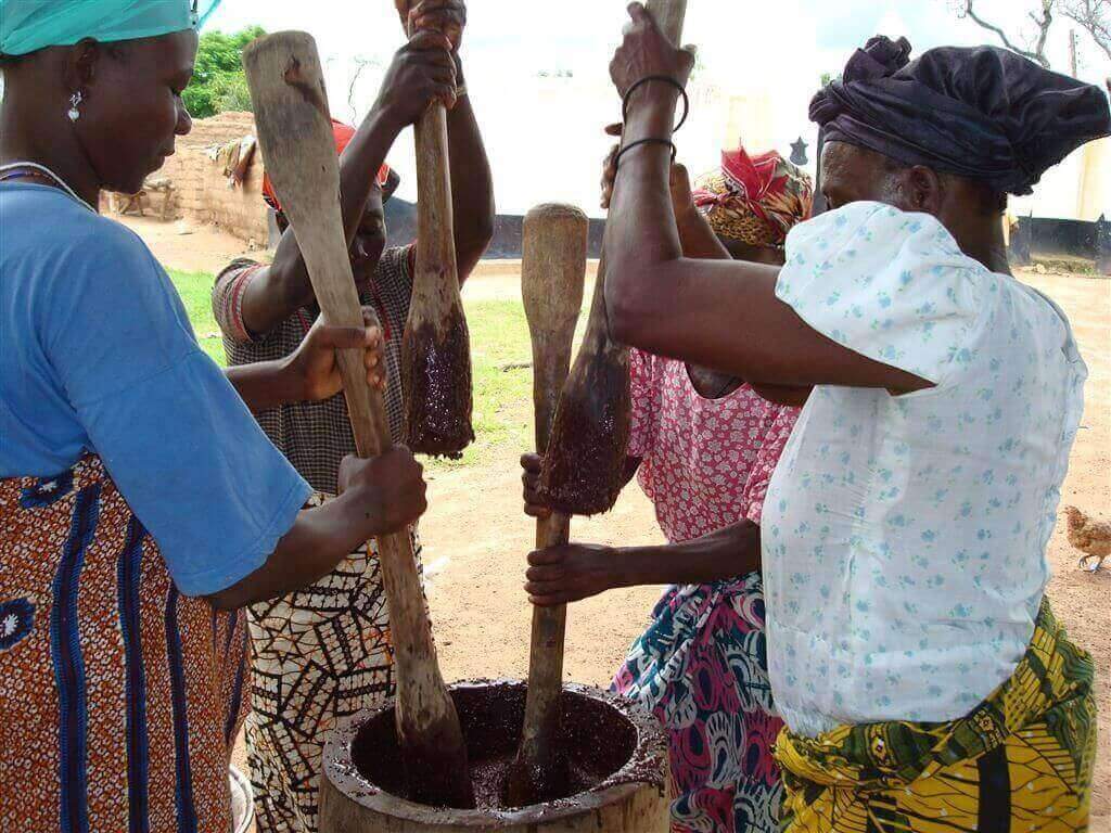 Multiple generations make shea butter together in the traditional way. This love and effort is felt in every bar of soap we make. Photo courtesy of barakasheabutter.com .