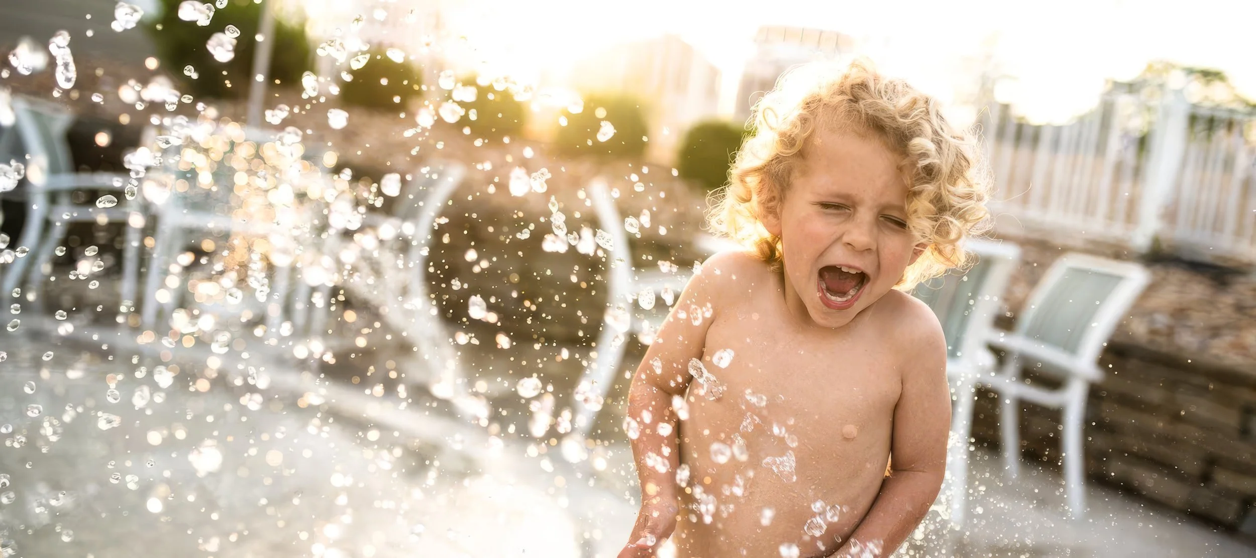 little-boy-in-splash-pool-at-margaritaville-lake-resort Topaz Gigapixel 4x scale.jpg