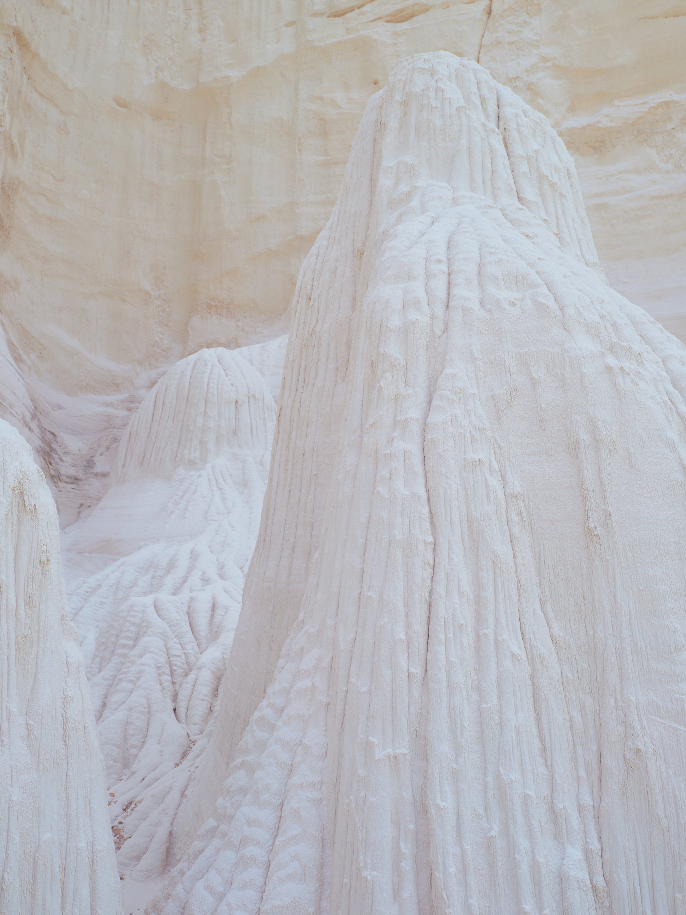 Close-up of white rock formations within a canyon.