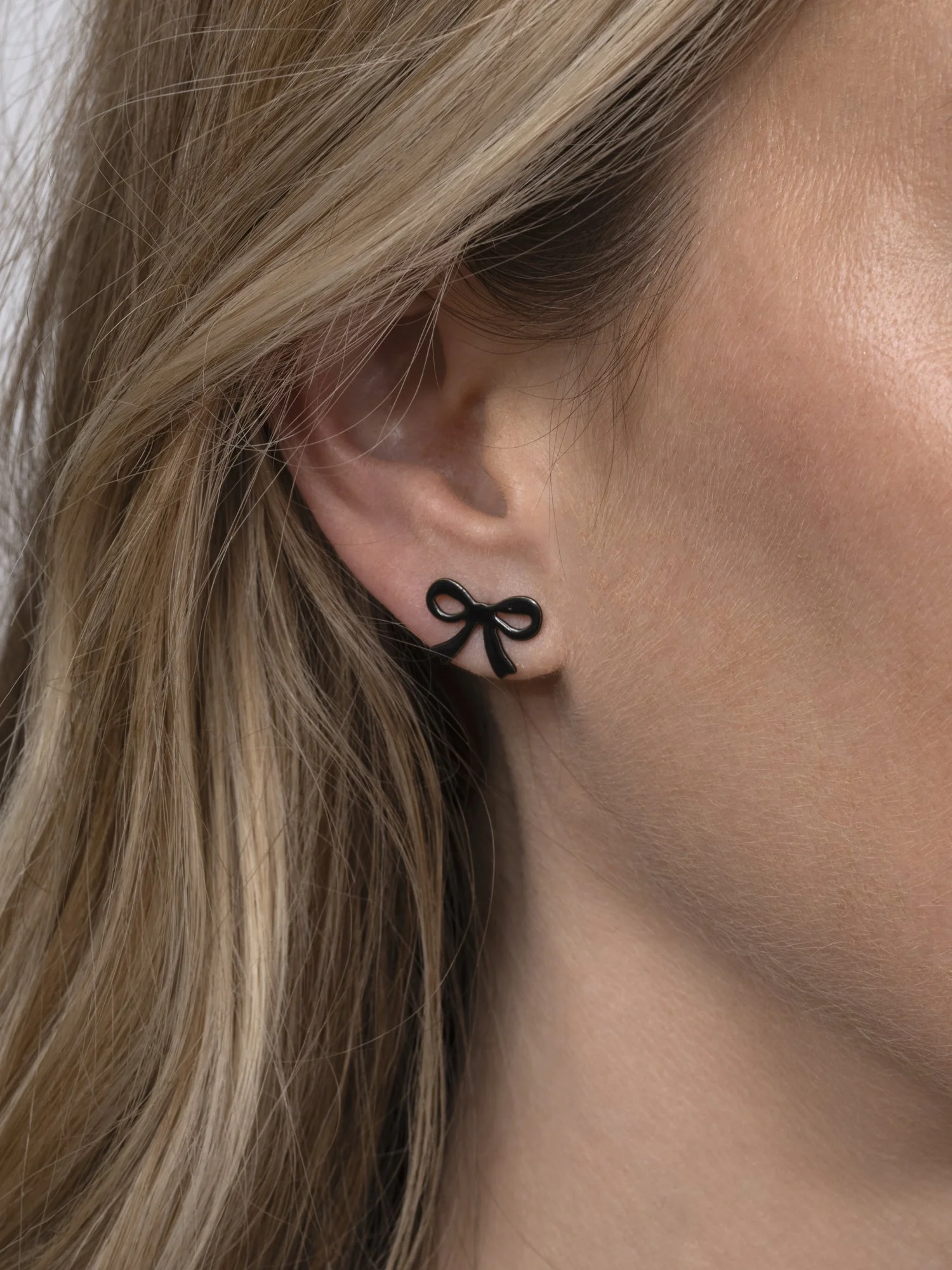 Iconic_Bow_Studs_Small_Black_OTB copy.jpg