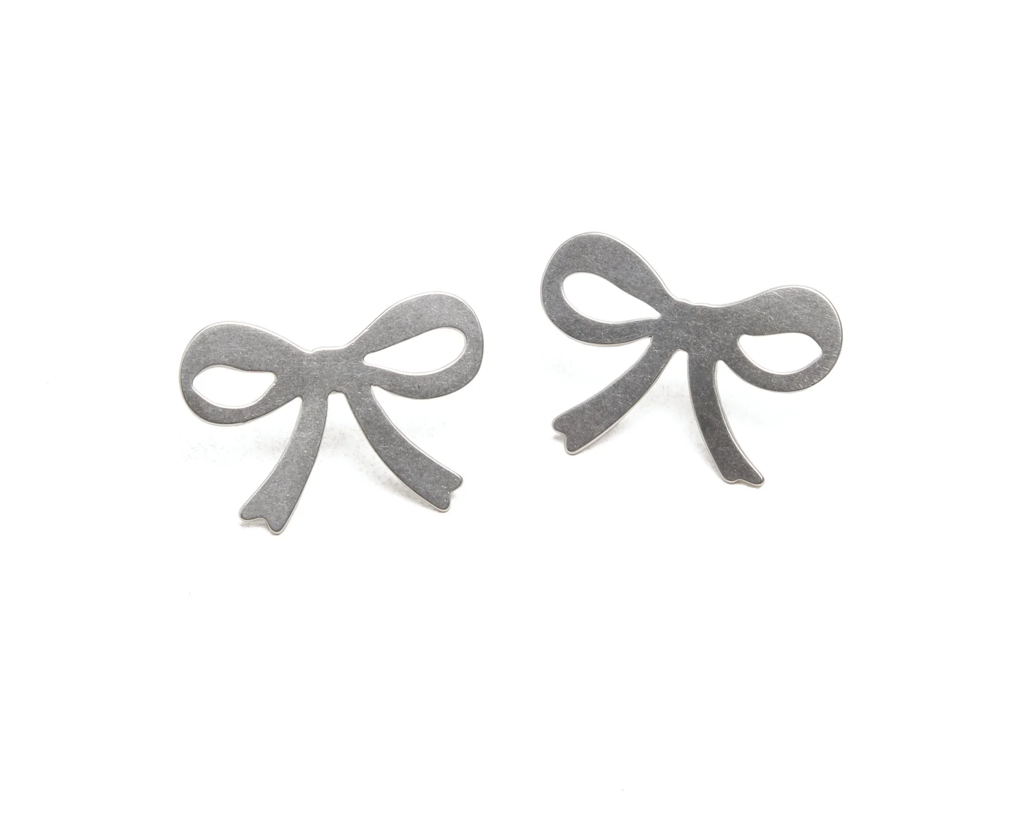 Iconic_Bow_Studs_lg_Silver copy.jpg