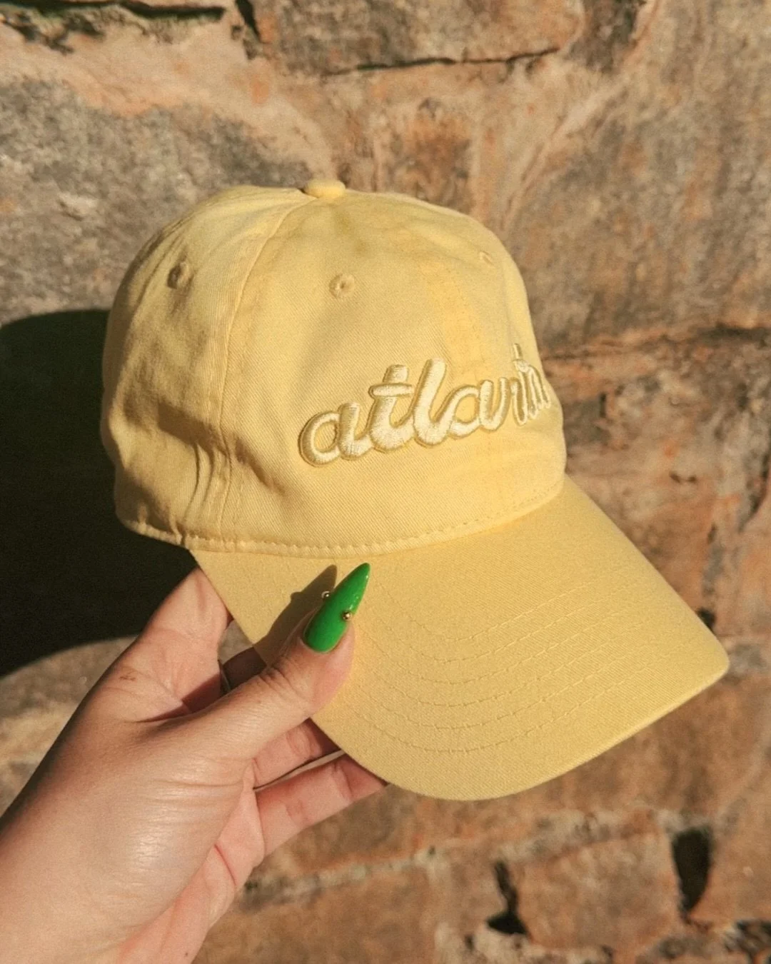 Buttery-soft, perfectly embroidered, an Atlanta monochrome yellow hat. Designed by @palindromeprint for @gladandyoungstudio 💛 Available exclusively in the G&amp;Y store now.