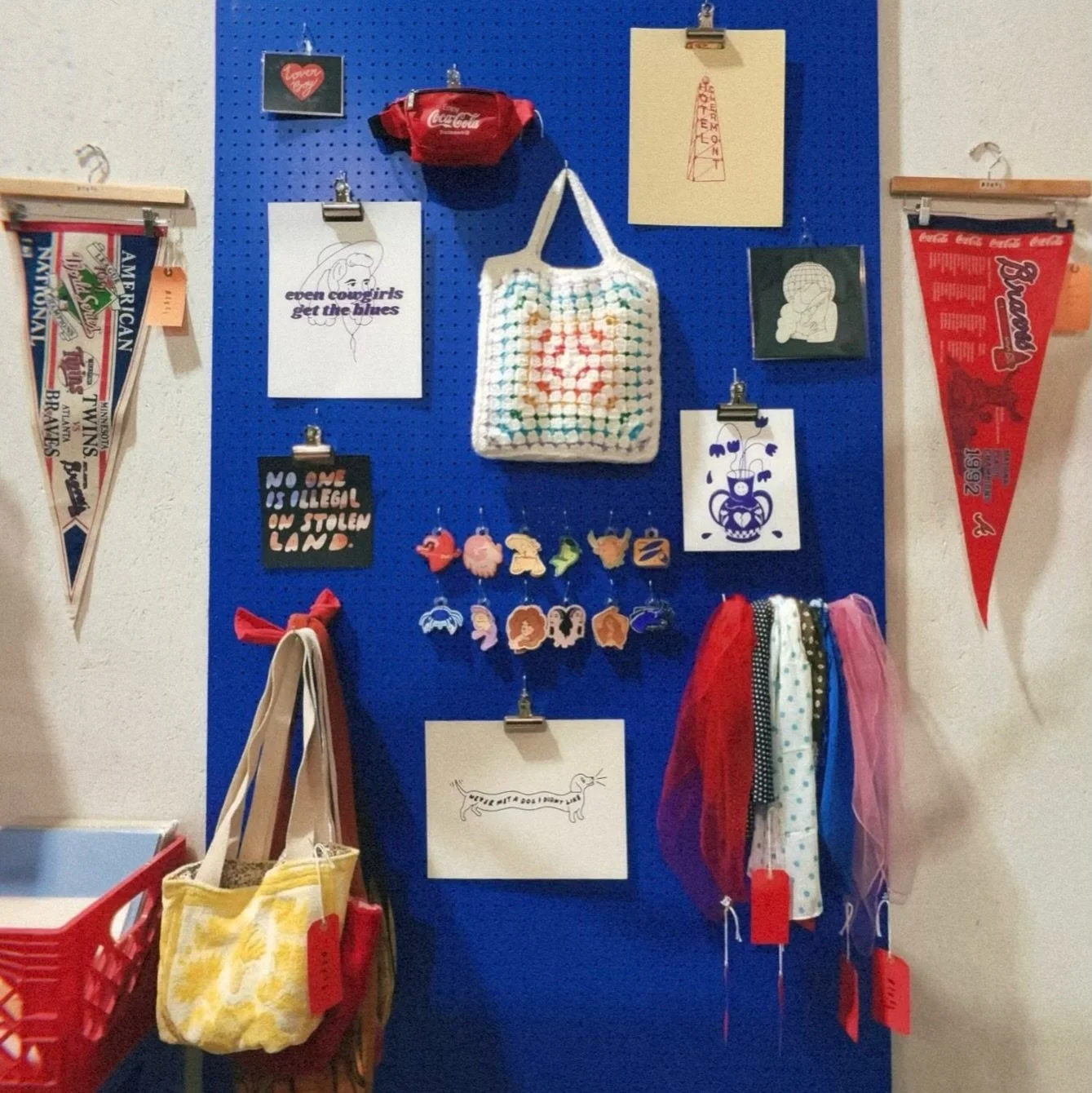 Silk scarves, charming bags, and vintage pennant flags. Come dig at @motherlodeatl 🚩