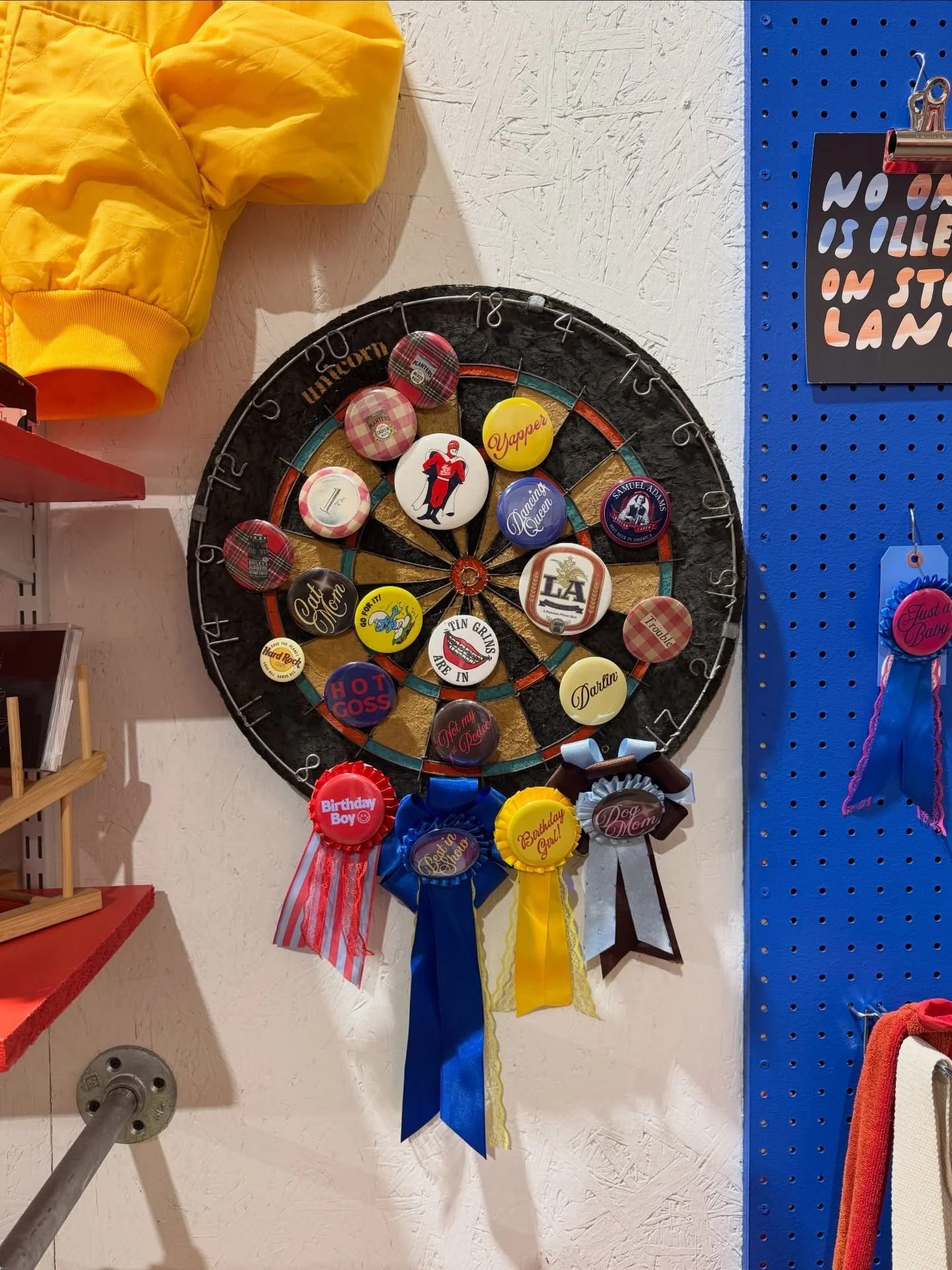 vintage + collaged + catchphrase pins from @revelgoodsco and @palindromeprint now hanging at @motherlodeatl ✿