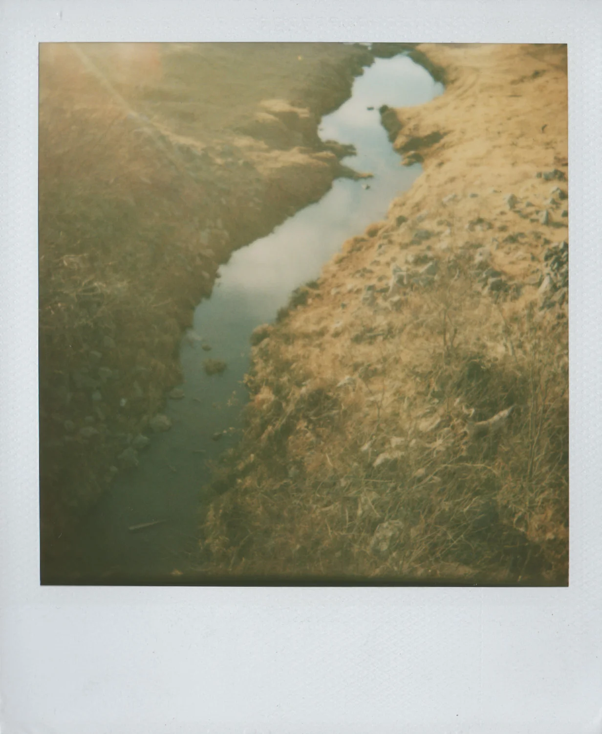 Clouds in the creek and my lover's gone