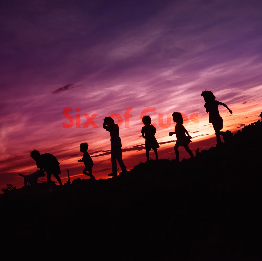 Six children silhouetted at play on a hilltop at sunset, the sky ablaze in purples and oranges. Their carefree movement evokes memory, innocence, and the sweetness of the past.