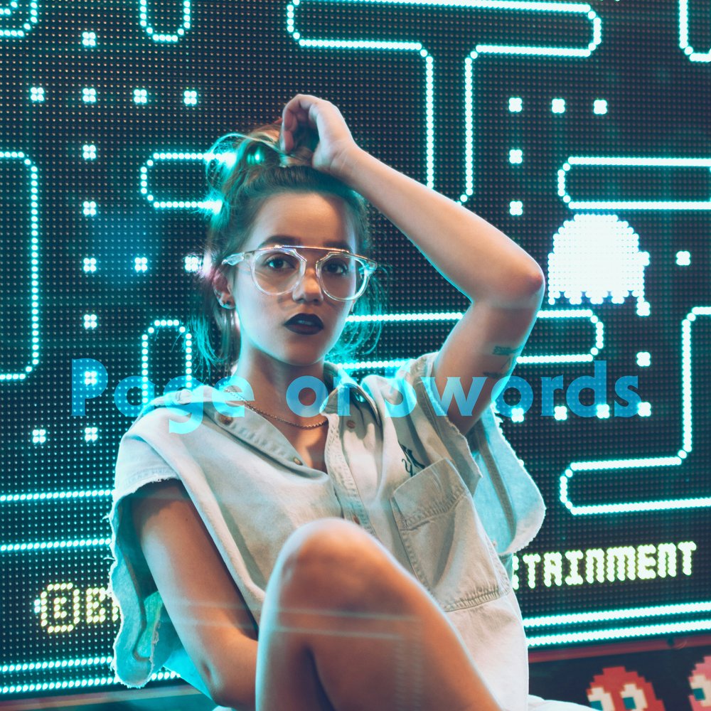 a sharp-eyed young person in oversized glasses sits confidently in front of a glowing retro arcade game. the light bathes them in blue and green, and their expression is playful but observant.