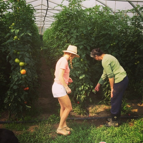 Justine and Jessica checking out tomatoes.