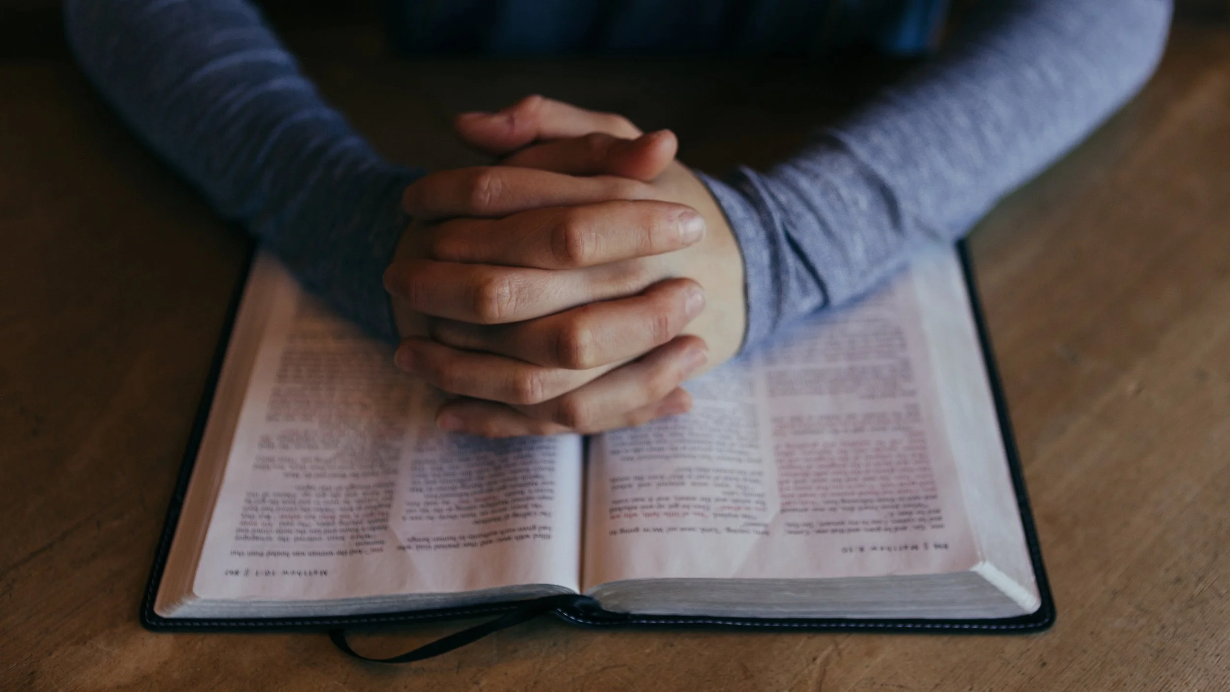 Praying Hands Bible Religious Stock Photo.jpg