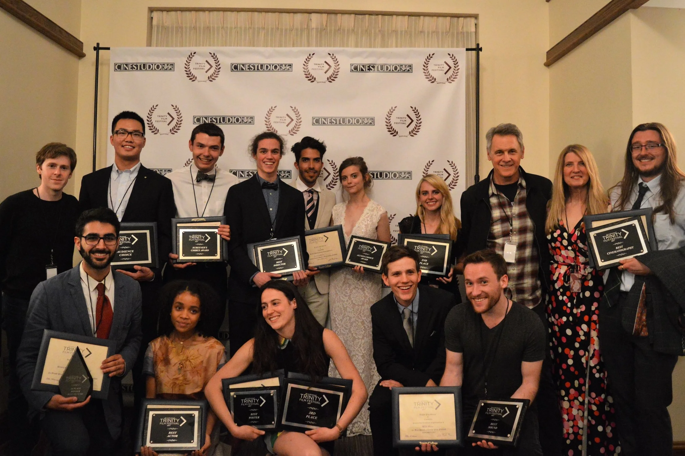 The 2017 winning filmmakers pose with guest judges Pierce Cravens, Kimberly Skyrme, and Mark Moses.