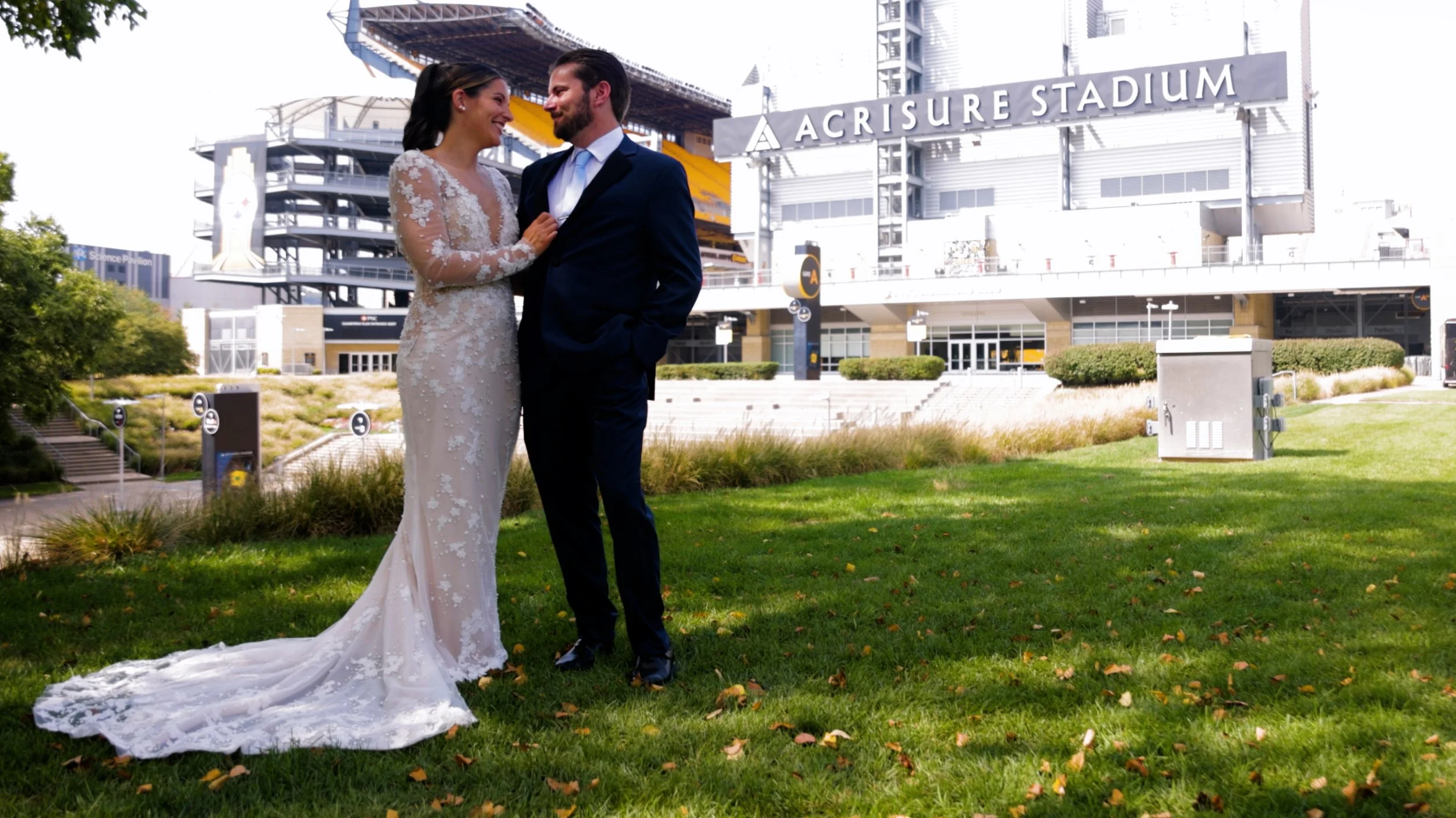 Wedding couple at Acrisure Stadium captured by Pittsburgh wedding videographer Blue Home Productions.