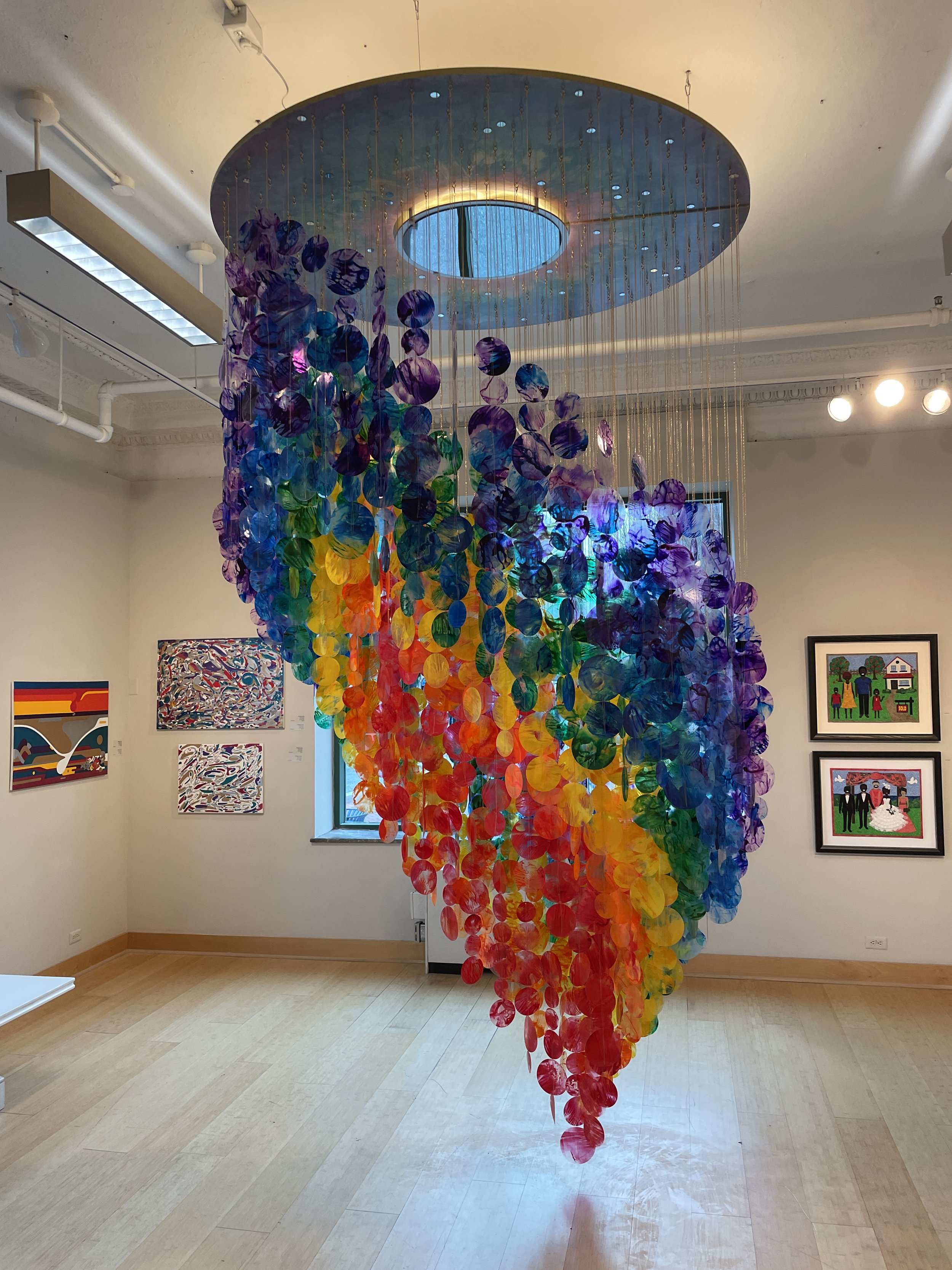   Suspended rainbow installation, giant immersive mobile art, Raleigh North Carolina installation artist, colorful kinetic rainbow sculpture, immersive installation, suspended sculpture, Raleigh North Carolina sculptor She Found Her Path By Looking W