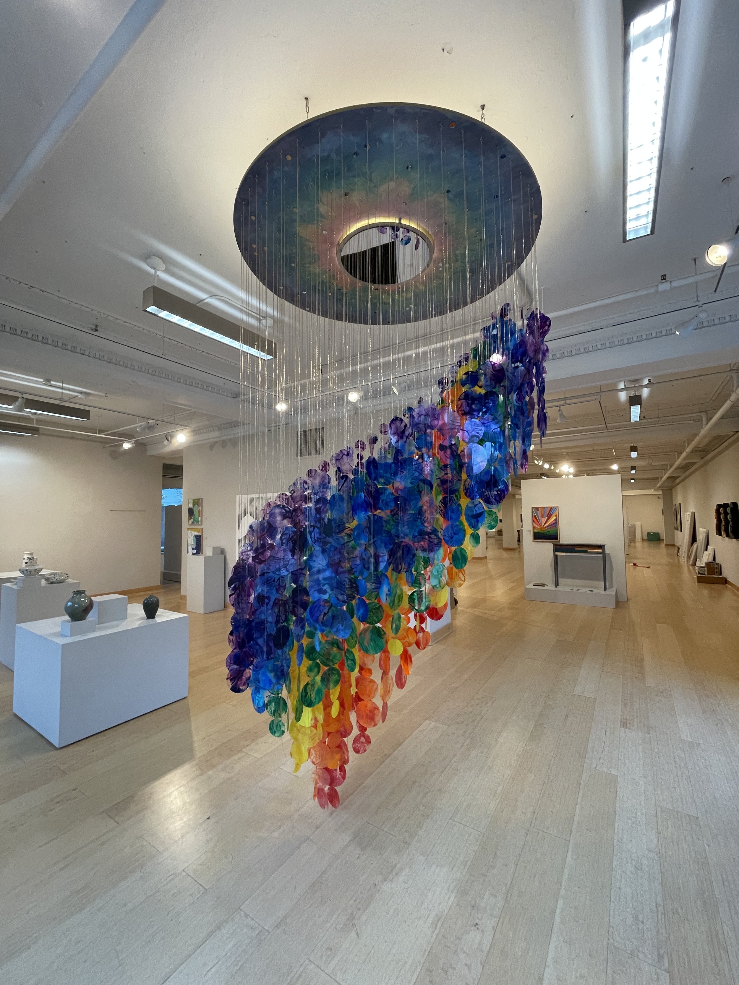   Suspended rainbow installation, giant immersive mobile art, Raleigh North Carolina installation artist, colorful kinetic rainbow sculpture, immersive installation, suspended sculpture, Raleigh North Carolina sculptor She Found Her Path By Looking W