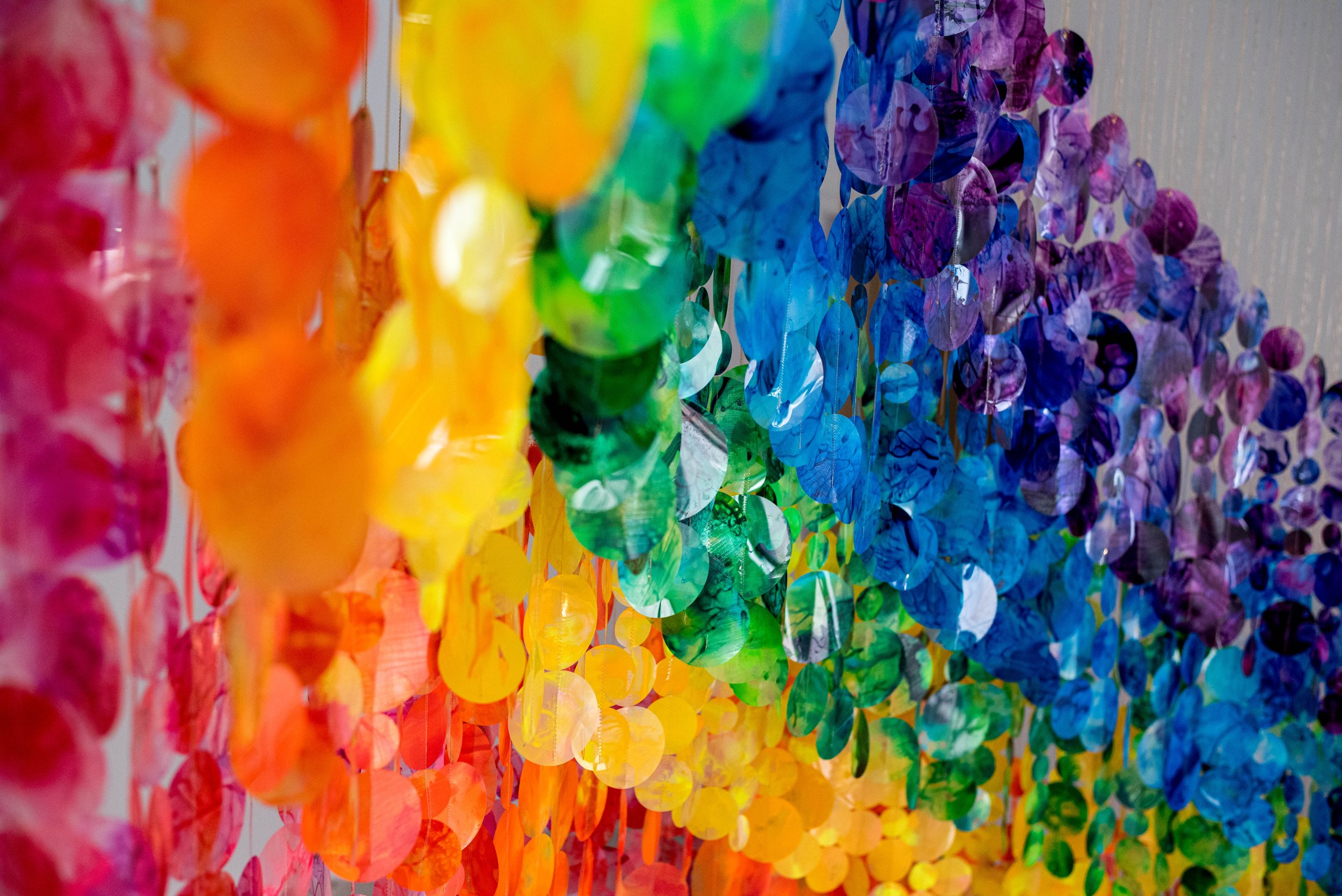   Suspended rainbow installation, giant immersive mobile art, Raleigh North Carolina installation artist, colorful kinetic rainbow sculpture, immersive installation, suspended sculpture, Raleigh North Carolina sculptor We Wondered If We Could Reach I