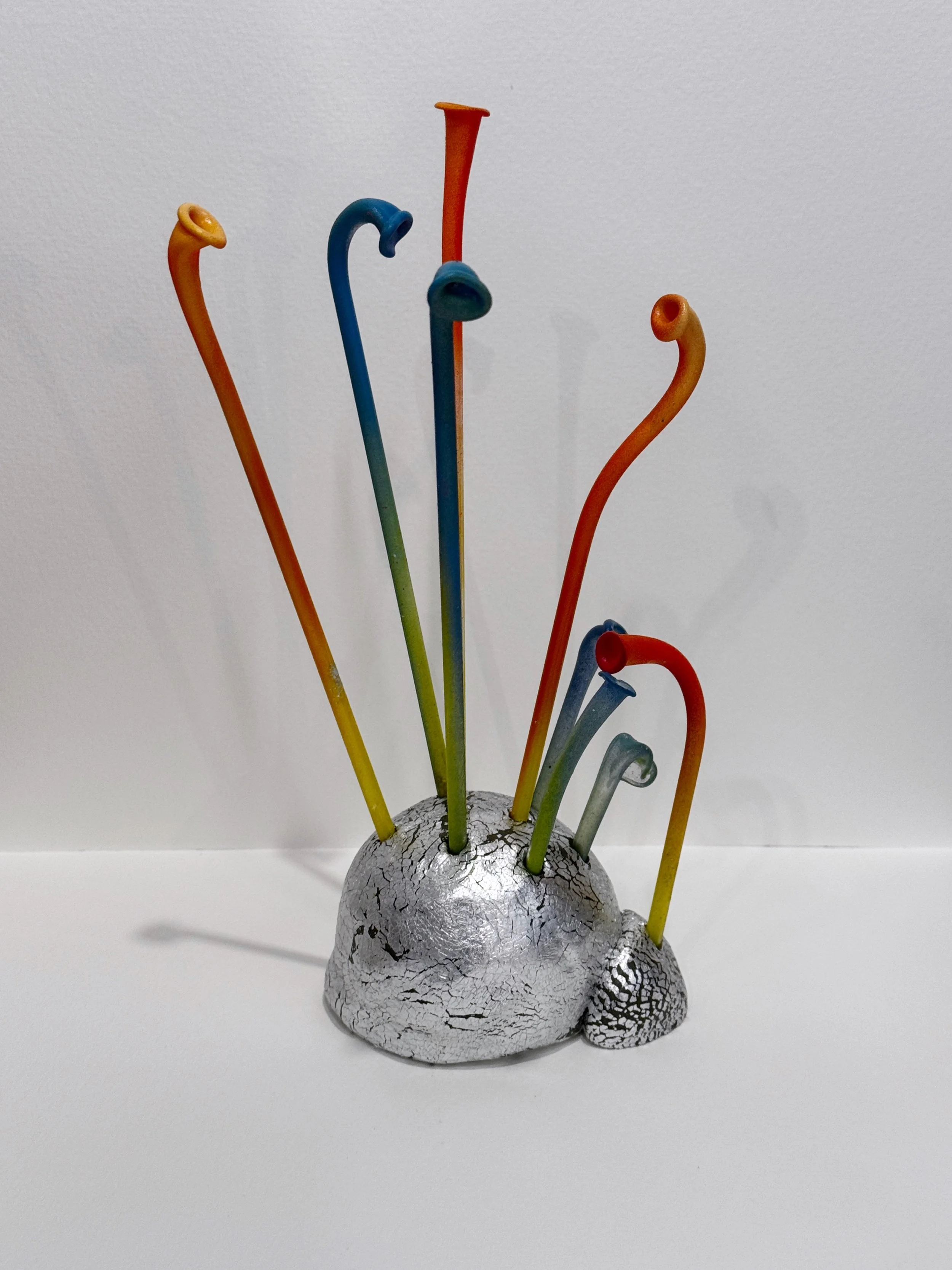 free standing sculpture, table top sculpture, bookshelf art, abstract plant sculpture, colorful whimsical art, alien plant sculpture, reclaimed materials, surreal art