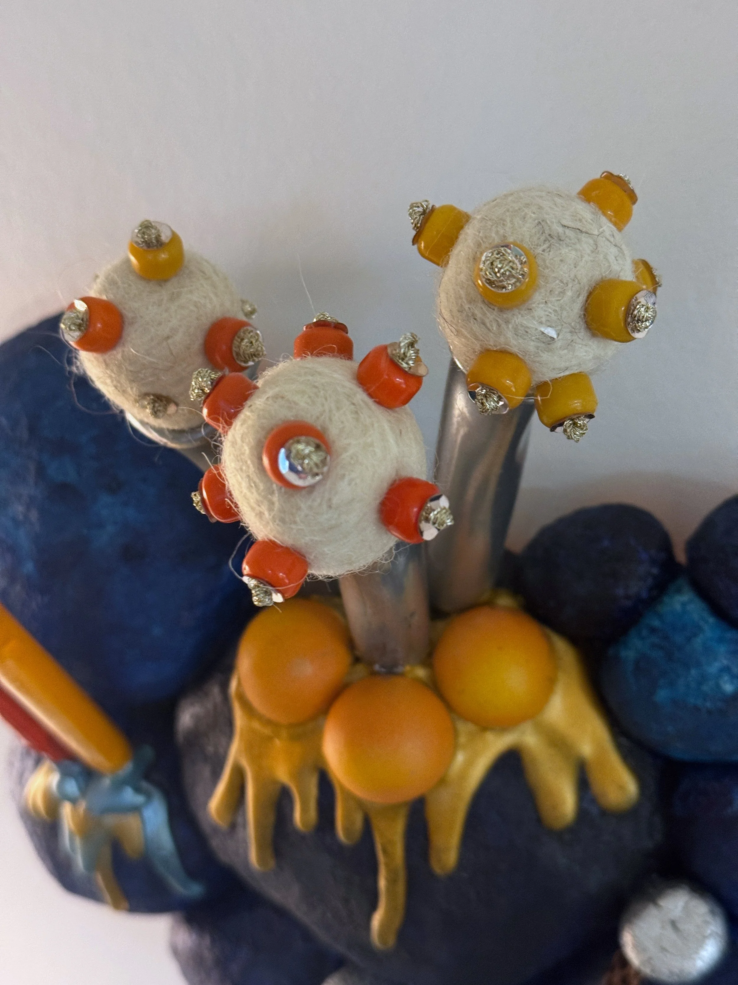 Blue wall sculpture, cairn sculpture, surreal art, alien plant sculpture, pop art sculpture, Jane Cheek, whimsical wall art
