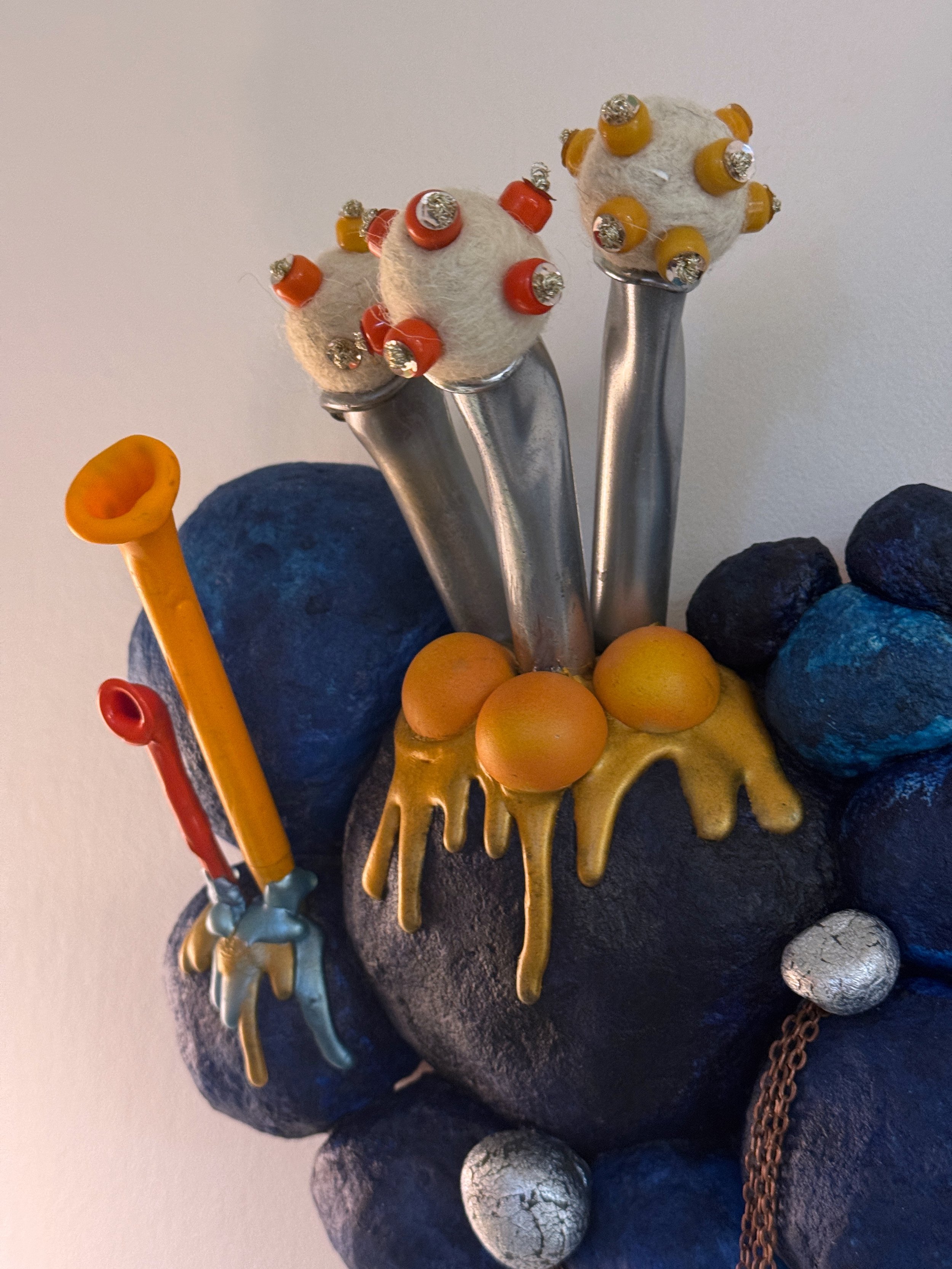 Blue wall sculpture, cairn sculpture, surreal art, alien plant sculpture, pop art sculpture, Jane Cheek, whimsical wall art