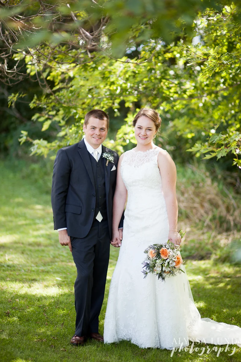 First look moment under the trees at outdoor weddings in Minneapolis