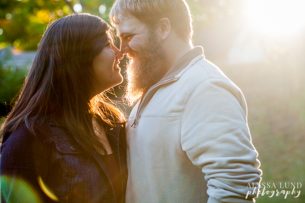 Sun-filled engagement portrait in Minneapolis park
