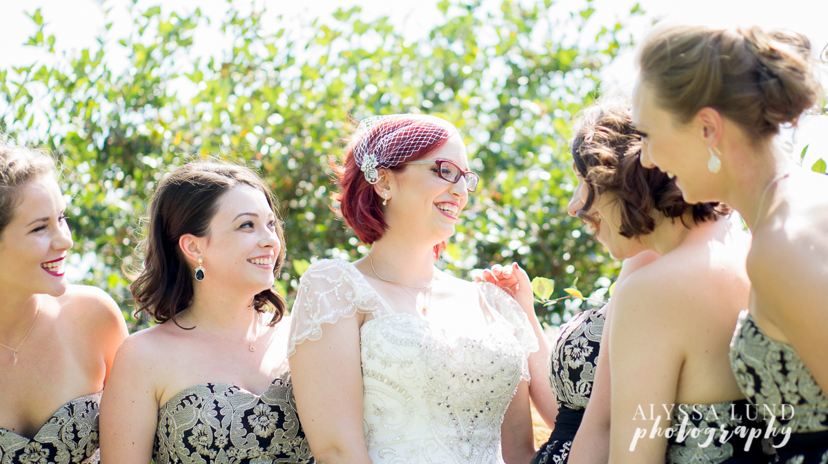 Bride and Bridesmaids in a sunny park