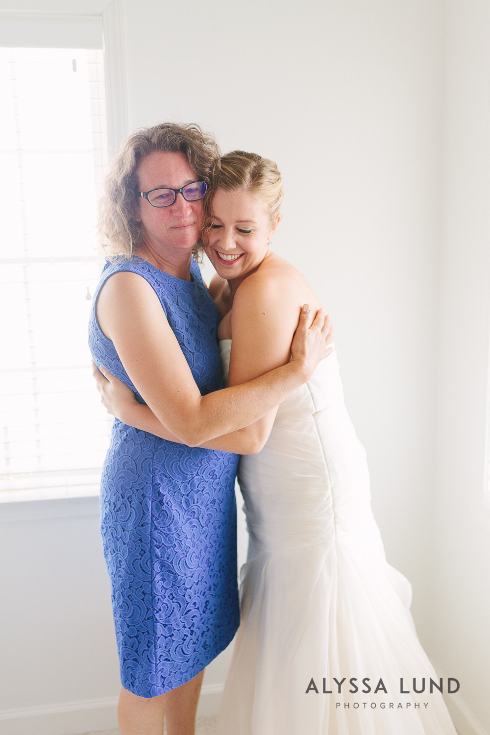  I love this sweet one of the bride's mom crying after Charlotte put on her dress!!&nbsp; 