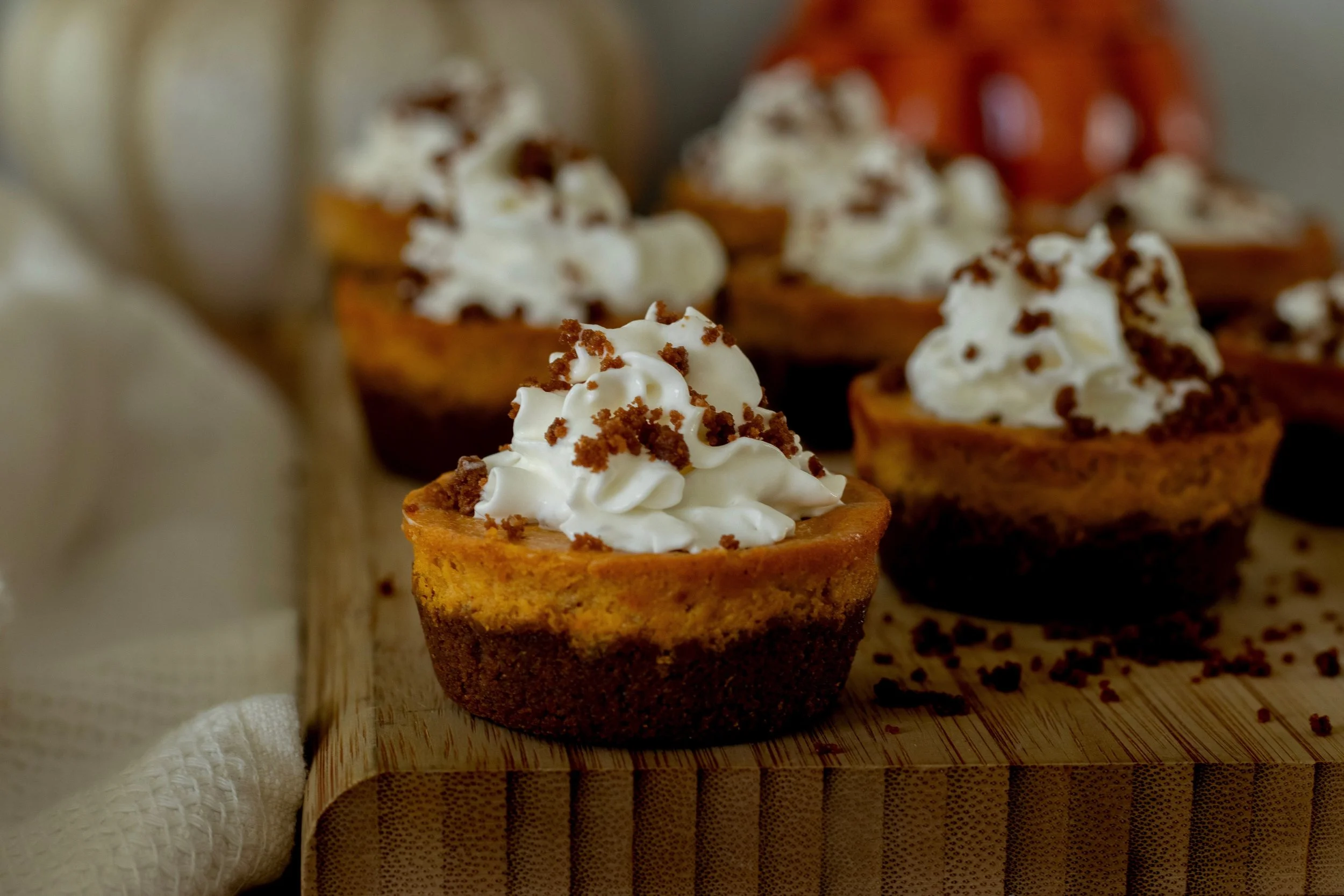 Mini Pumpkin Cheesecake Pies with Gingersnap Crust
