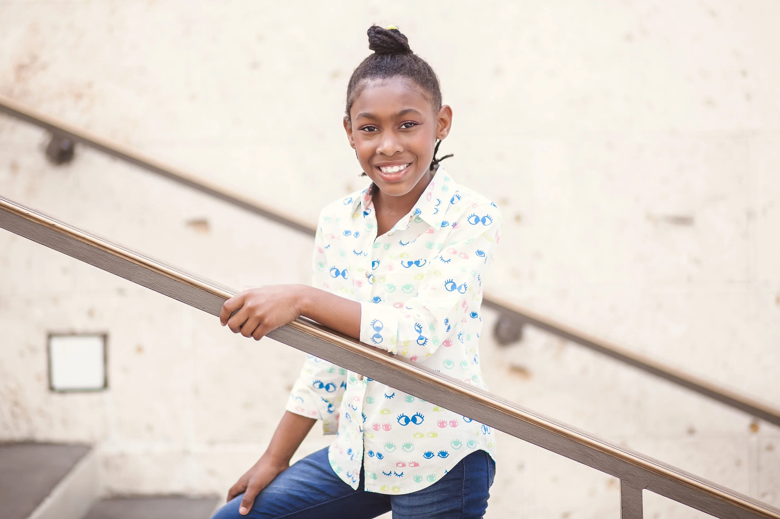 Happy girl in History Miami Museum gets adopted. Photo by Janeris Marte-Miami photographers