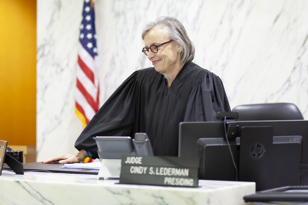 Judge Cindy Lederman smiling during an adoption in Miami Children’s Courthouse