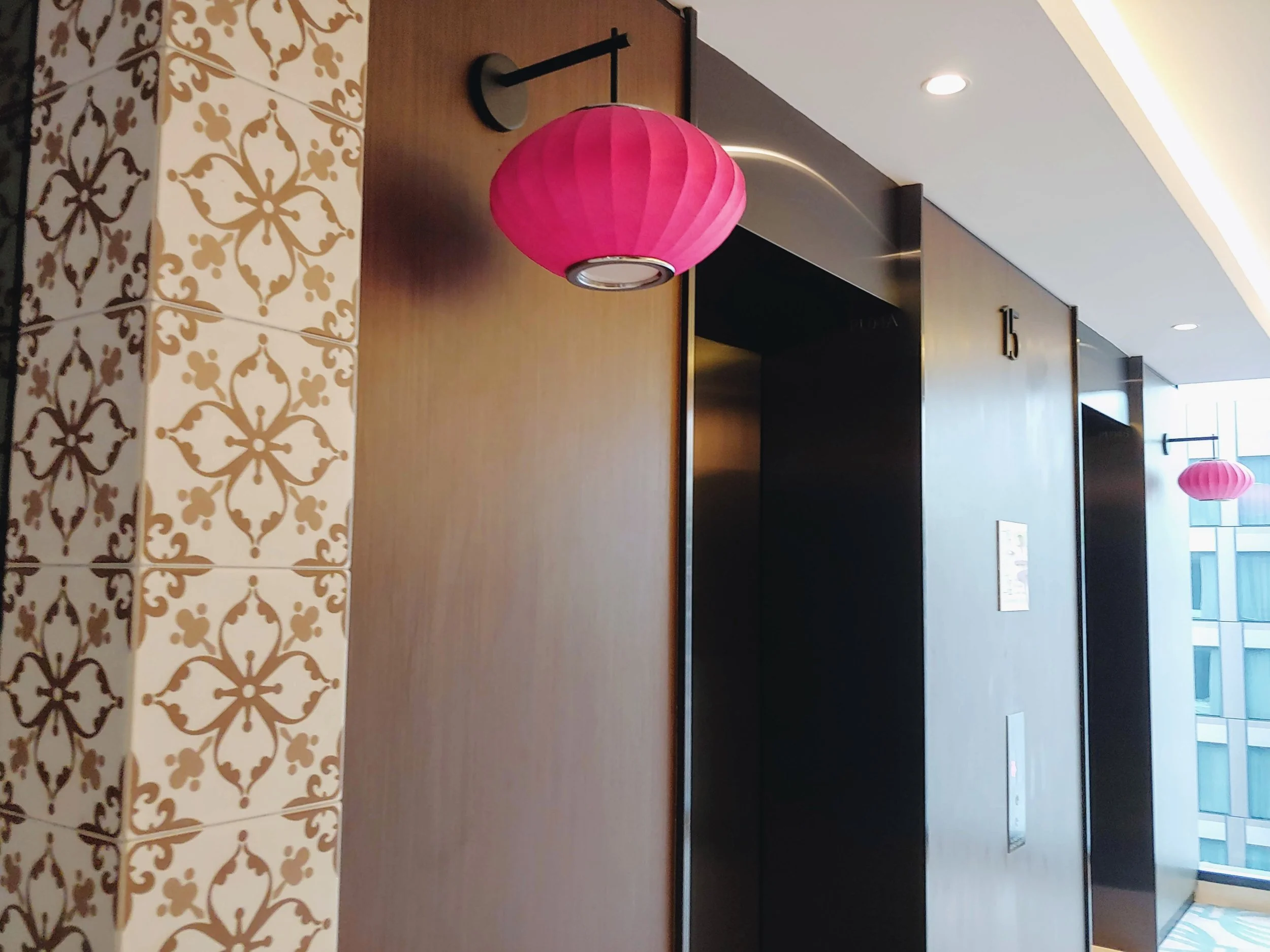 Love the pink lanterns at the side of the lifts - do you know that it will light up to indicate that the lift has arrived? How cute!