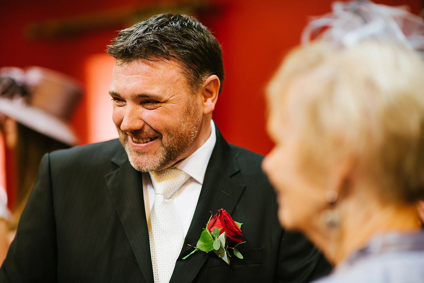 telephoto lens shot of groom