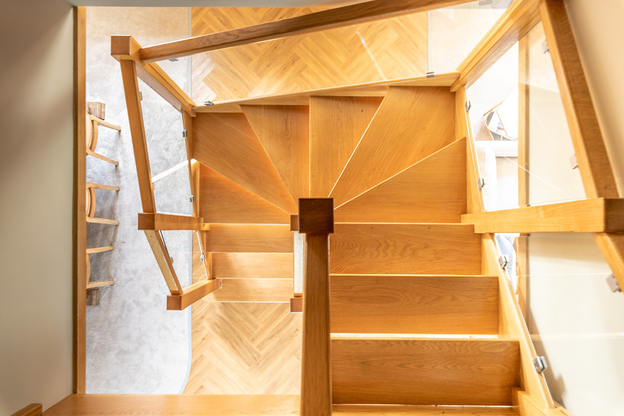 Top down view of a beautiful hand crafted wooden staircase (Copy)