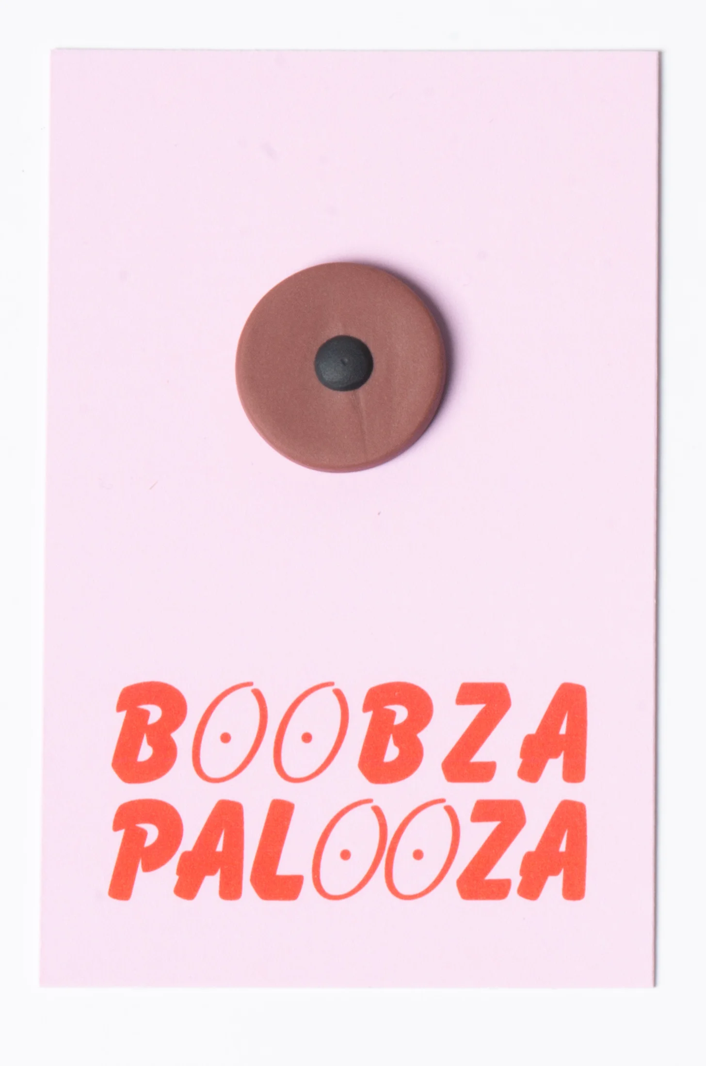 Brown boob pin.jpg