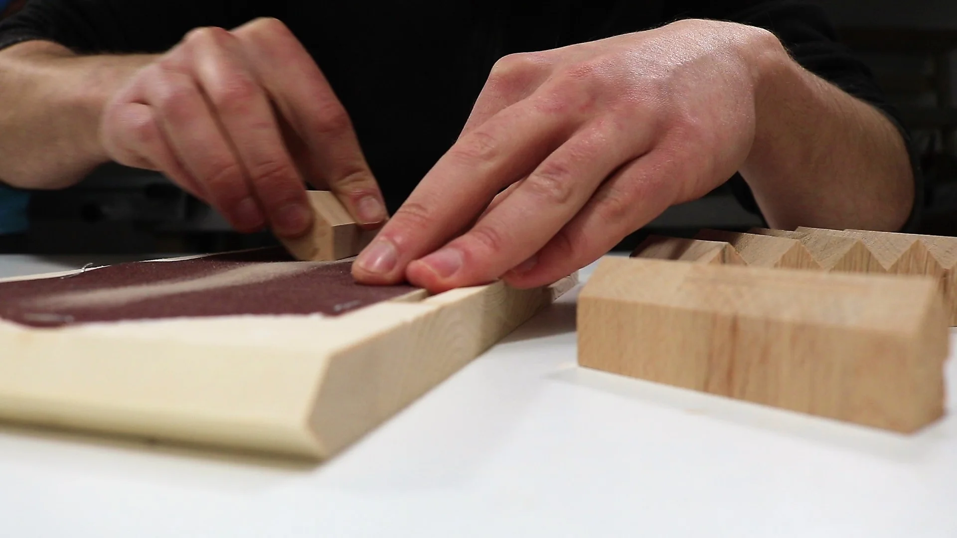 Sand using sandpaper with the grit of 120. Be sure you will not sand the corners, it should remain sharp.
