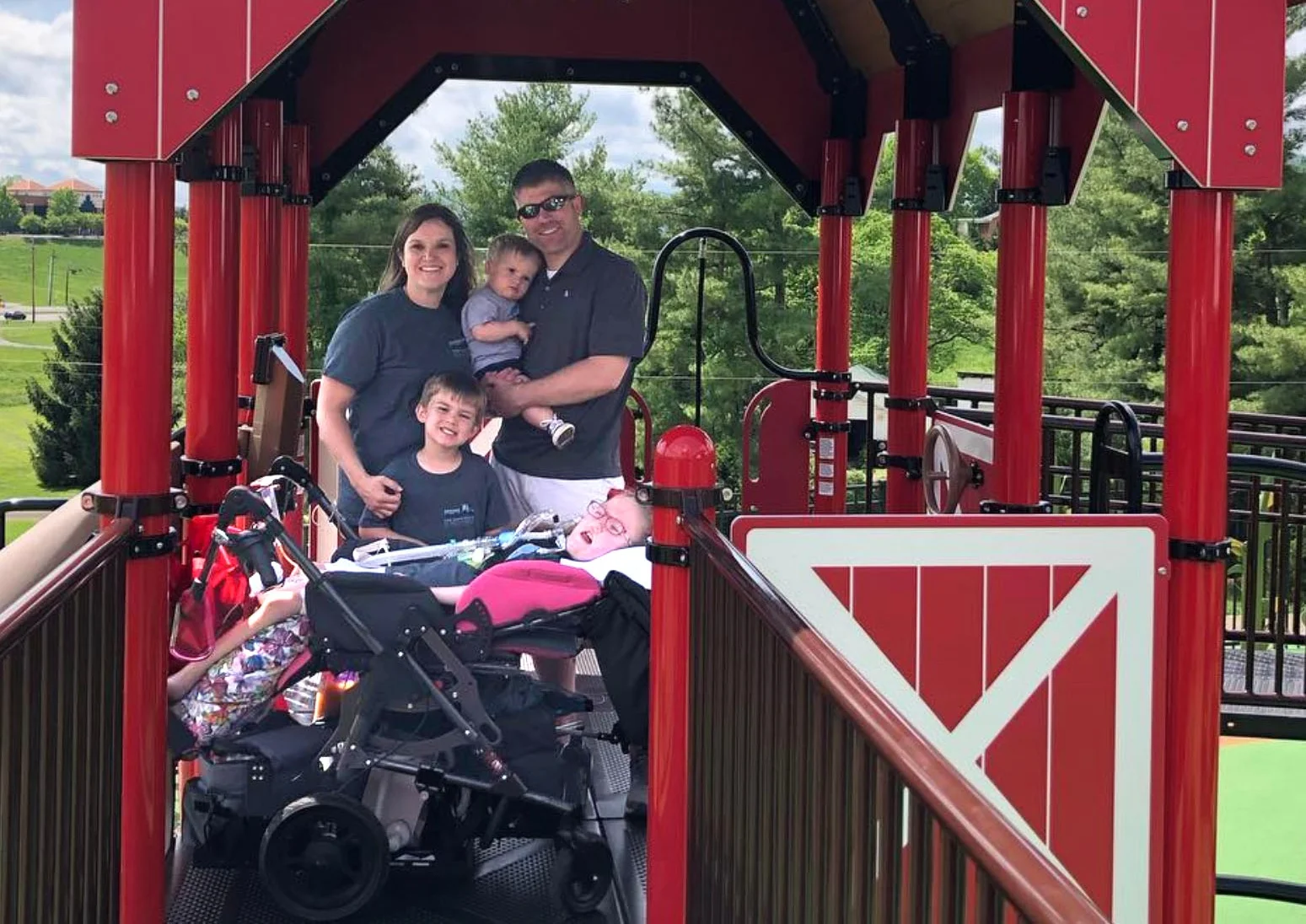 Jennifer & James Garner with their children (Bryson, Colson & Addy Grace) at the Addy Grace All-Abilities Playground.