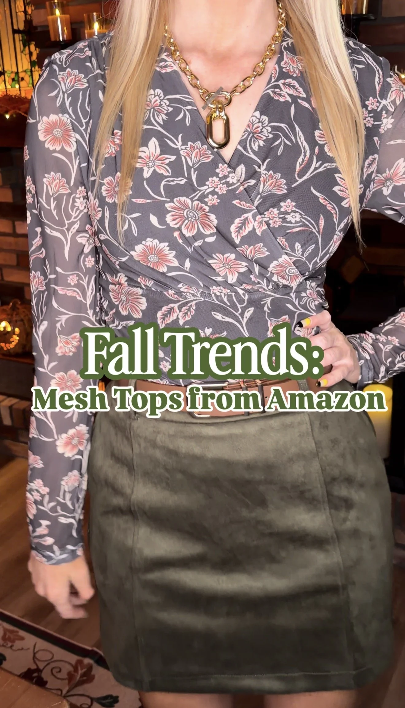 Up close on staying a Grace Karin mesh wrap top found on Amazon for fall with a green suede skort and belt for fall.
