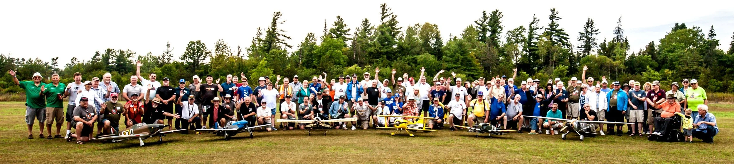 Pilots gather for the traditional noontime group photo