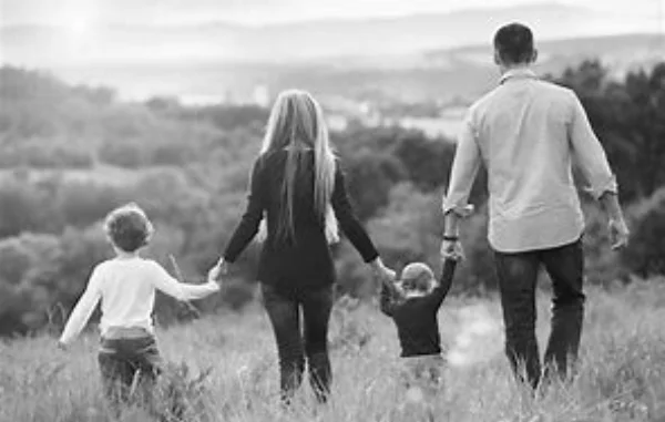 happy family in grass.jpg