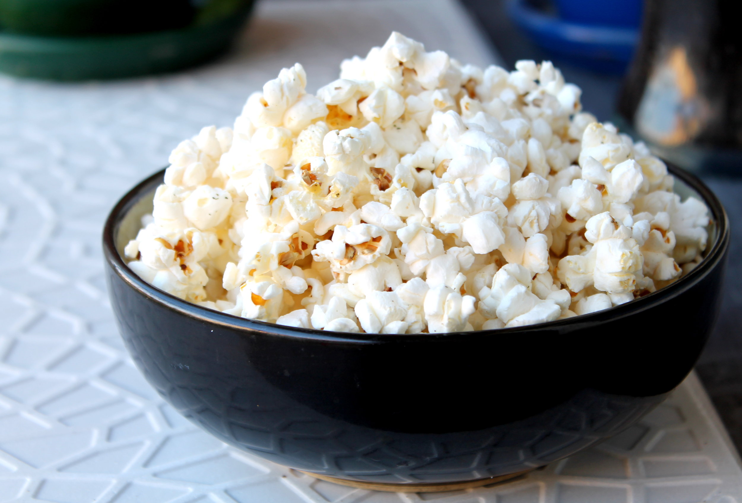 Stove-top popcorn is exactly what you need while binge watching tv - it's a nutritious snack, naturally gluten-free, vegan and literally takes 5 minutes to pop!