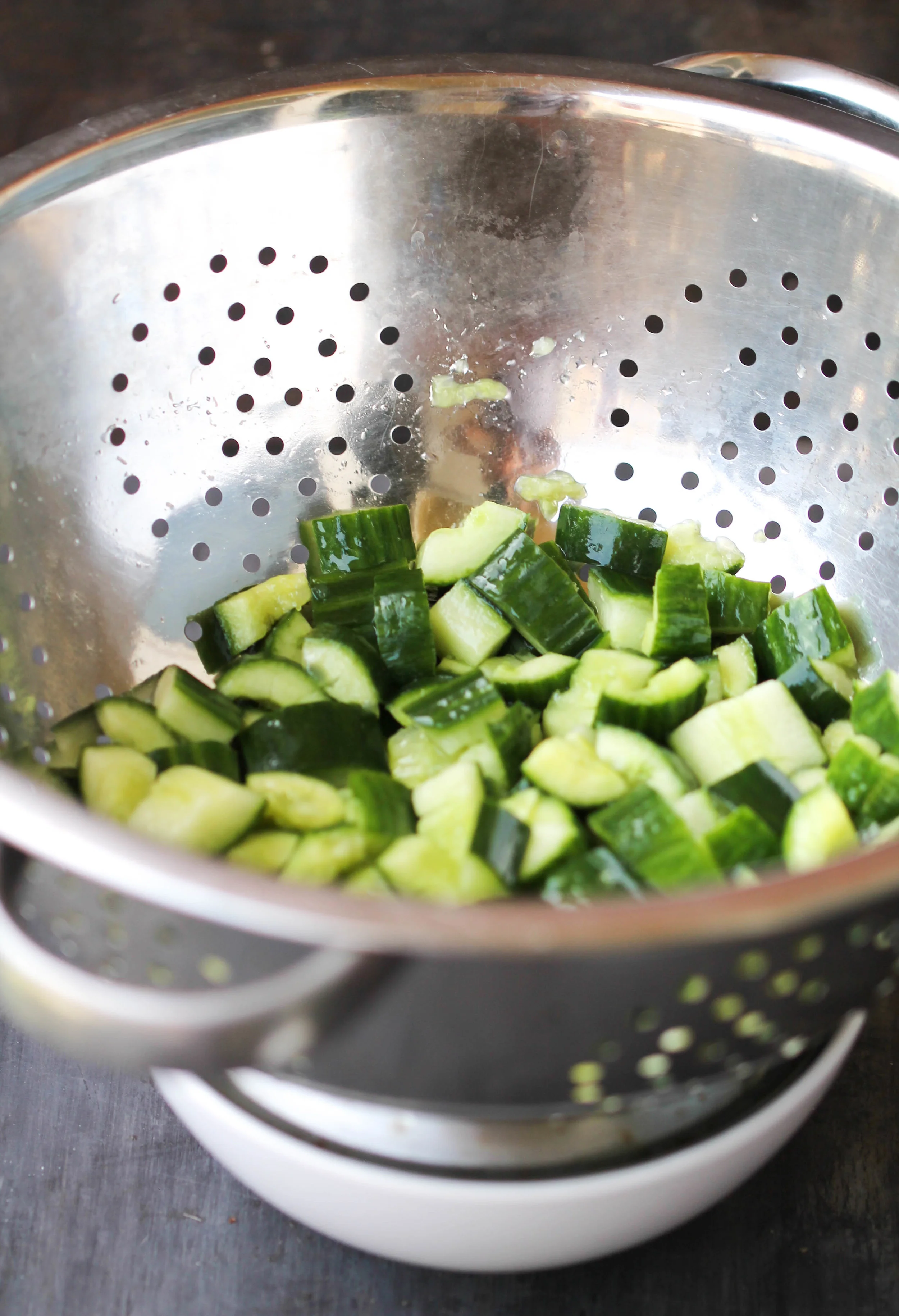 Smashed Cucumber Salad is an easy, refreshing, and flavorful salad influenced by Chinese flavors. It comes together in 5 minutes or less, feeds the crowd, also is naturally vegan, gluten-free friendly!