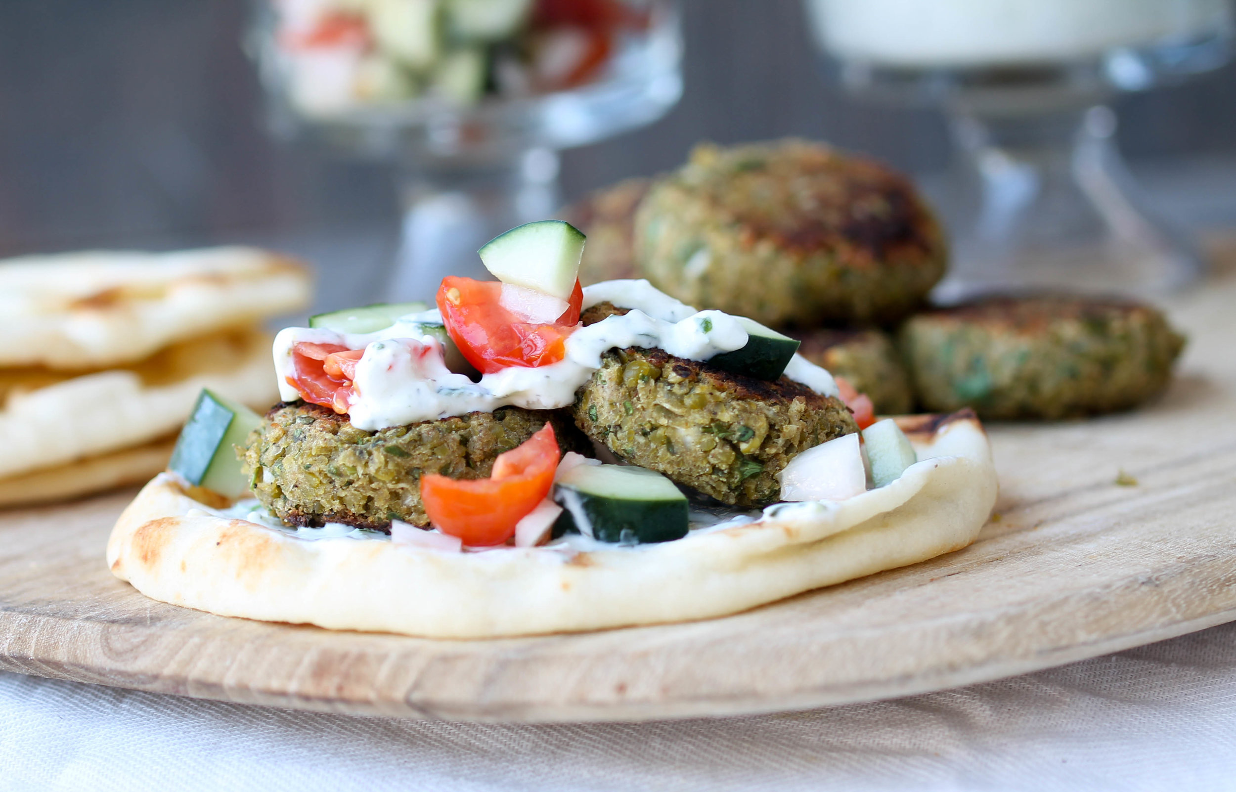 Split Green Peas Falafel are weeknight friendly, make-ahead, and healthier take on traditional falafel. These are gluten-free, vegan friendly as well!